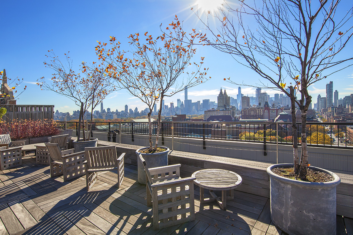 51 West 81st Street, Unit 9D Manhattan, NY 10024 - Photo 11 of 15 a view of a patio with couches table and chairs and potted plants