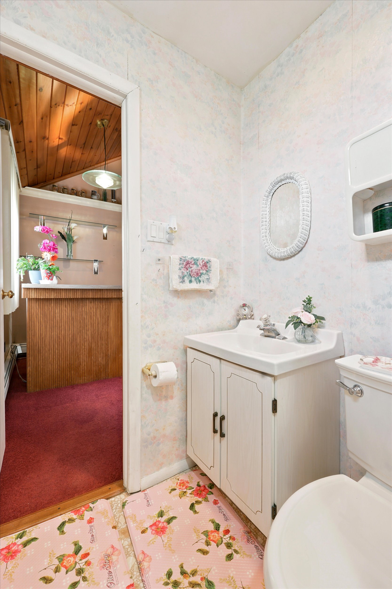 897 Pine Hill Avenue Philadelphia, PA 19115 - Photo 20 of 22 a bathroom with a sink a toilet and a mirror