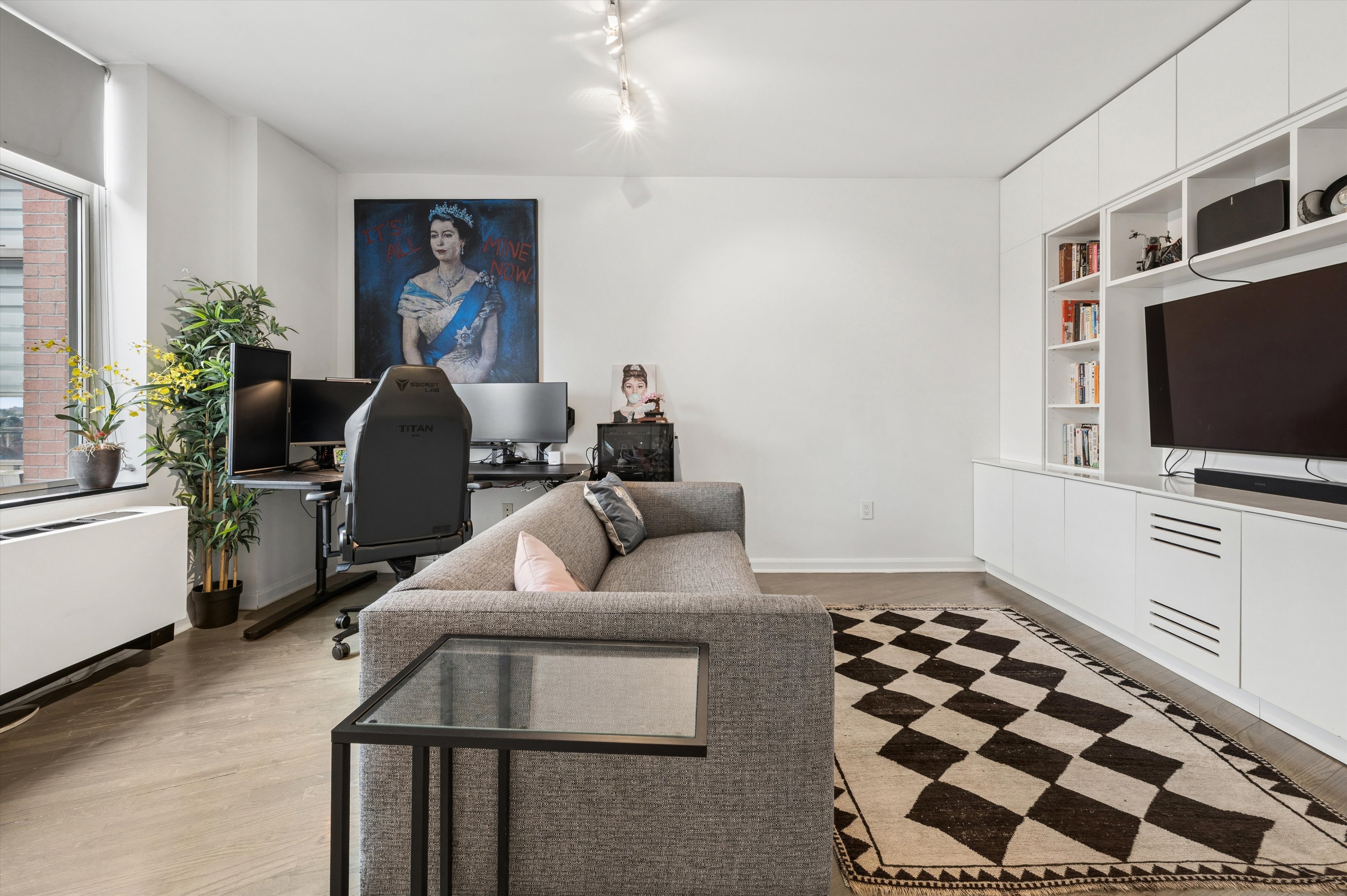 3625 Oxford Avenue, Unit 7C Bronx, NY 10463 - Photo 8 of 20 a living room with furniture and a flat screen tv