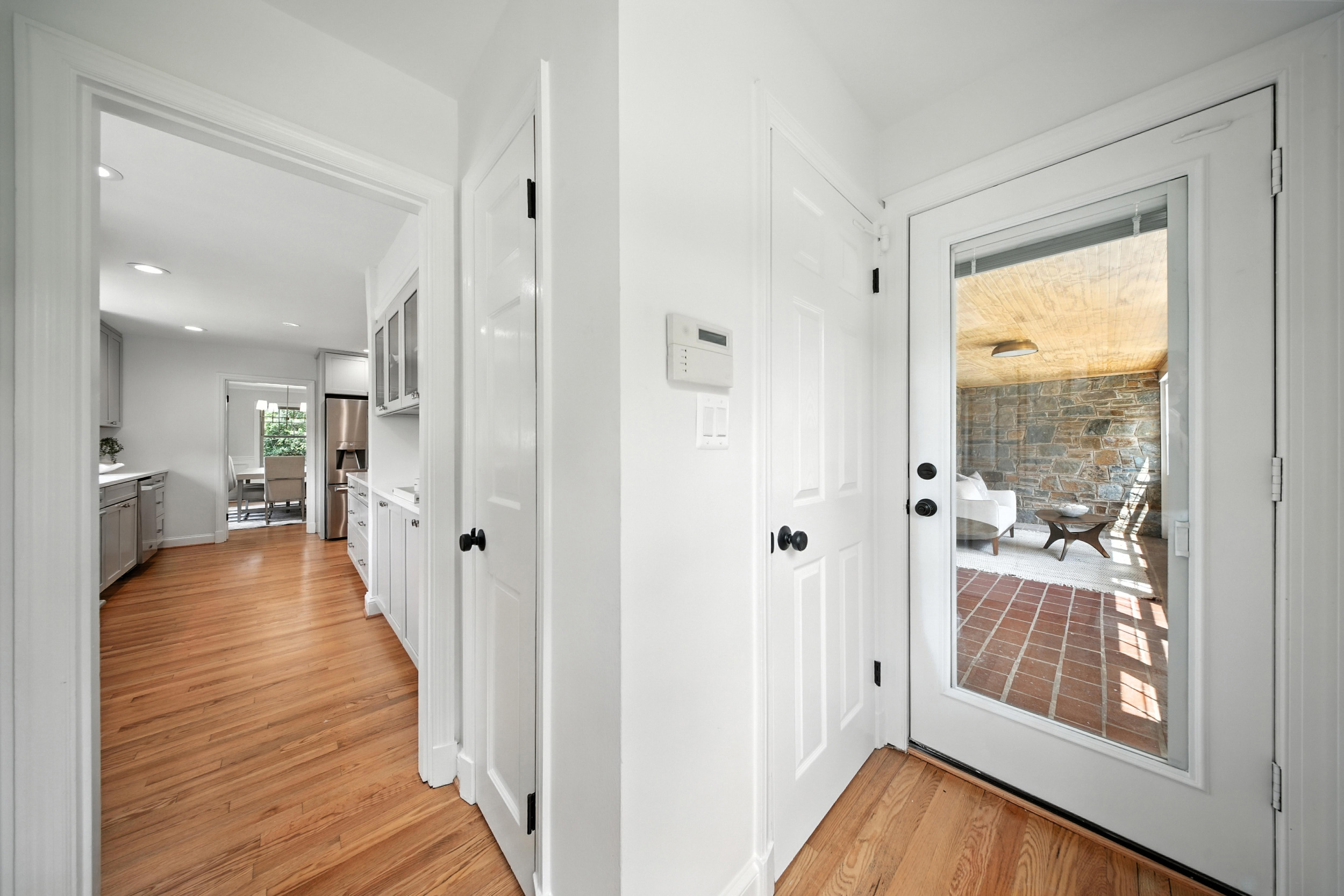 4505 Park Road Alexandria, VA 22312 - Photo 18 of 80 a view of a hallway with wooden floor and a bathroom