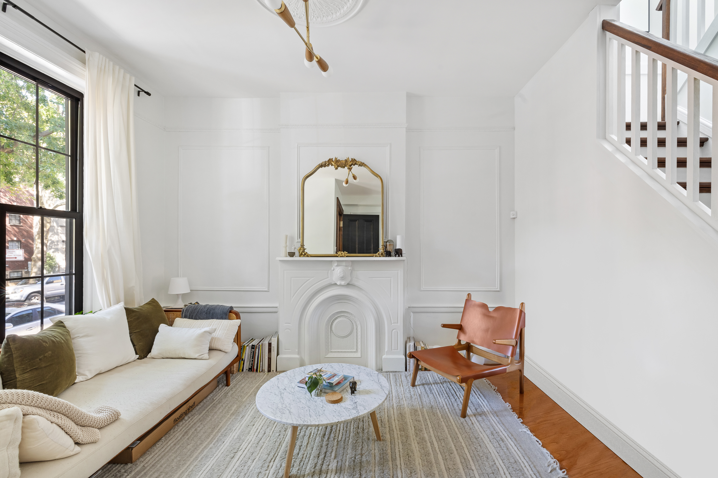 716 Monroe Street Brooklyn, NY 11221 - Photo 2 of 22 a living room with furniture and wooden floor