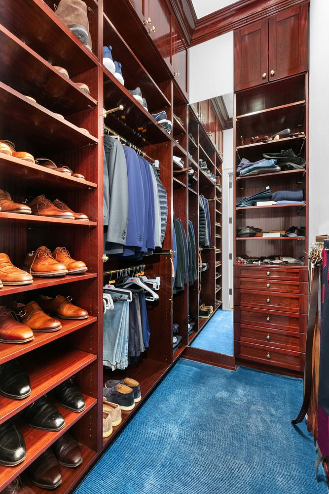 1 Central Park South, Unit 913 Manhattan, NY 10019 - Photo 5 of 23 a view of walk in closet with clothes and shoes