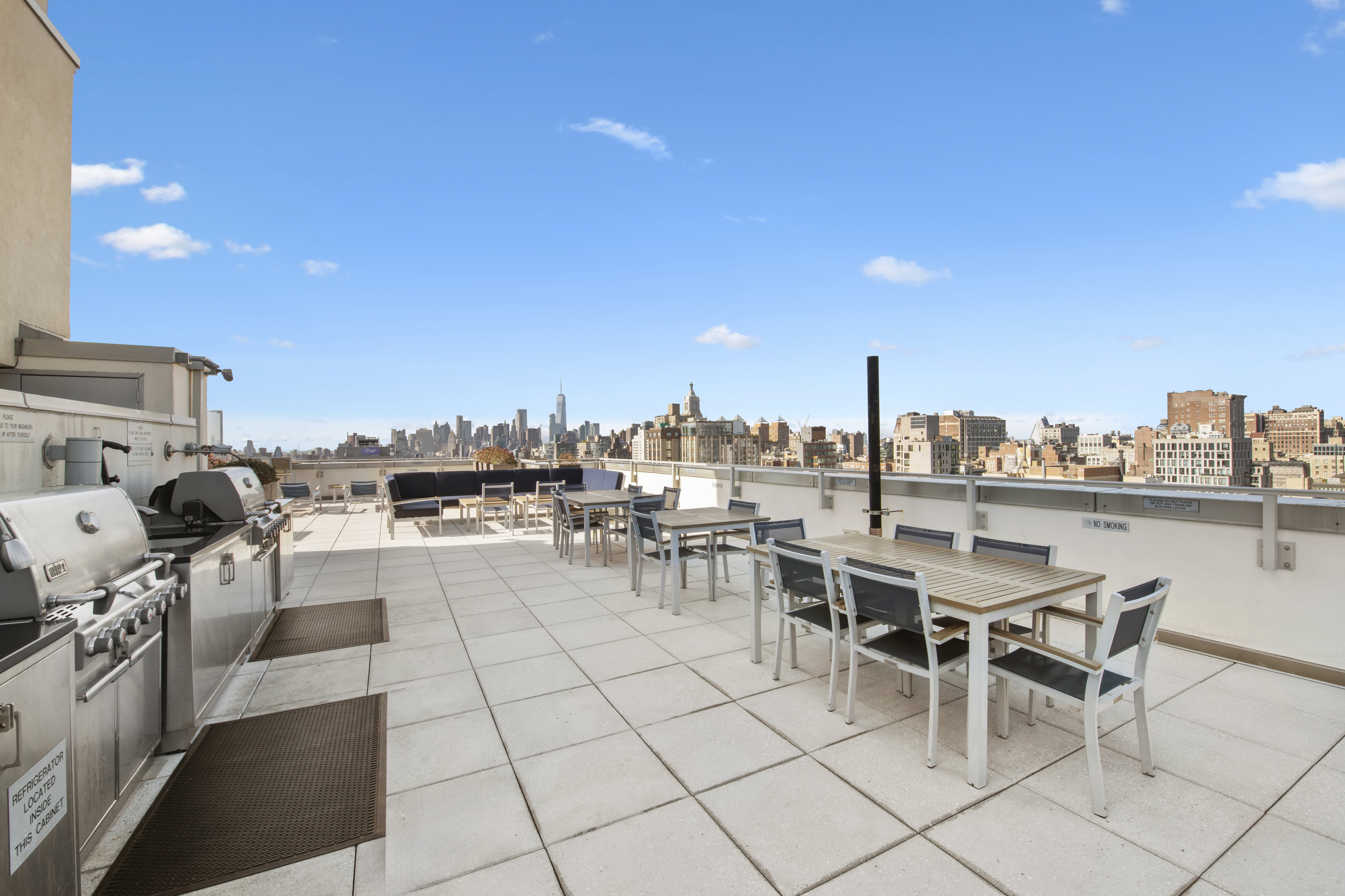 300 East 23rd Street, Unit 7A Manhattan, NY 10010 - Photo 11 of 15 a view of a terrace with furniture and city view