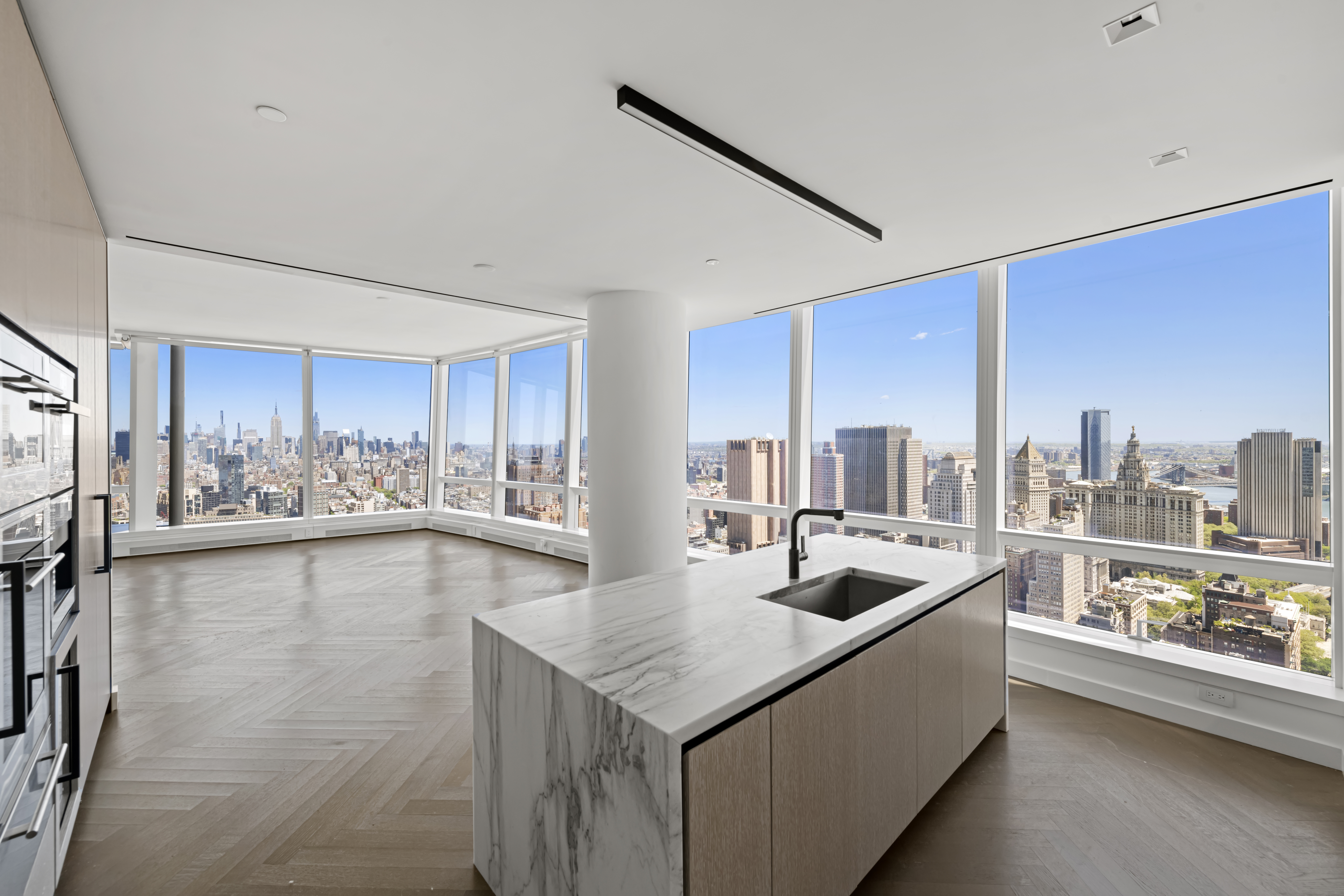 111 Murray Street, Unit 51EAST Manhattan, NY 10007 - Photo 8 of 42 a kitchen with a sink and cabinets