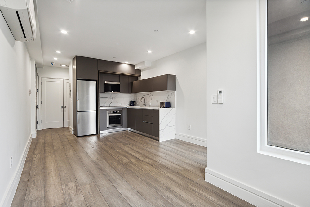 143 Winthrop Street, Unit 3C Brooklyn, NY 11225 - Photo 1 of 9 a view of kitchen appliances wooden floor and window