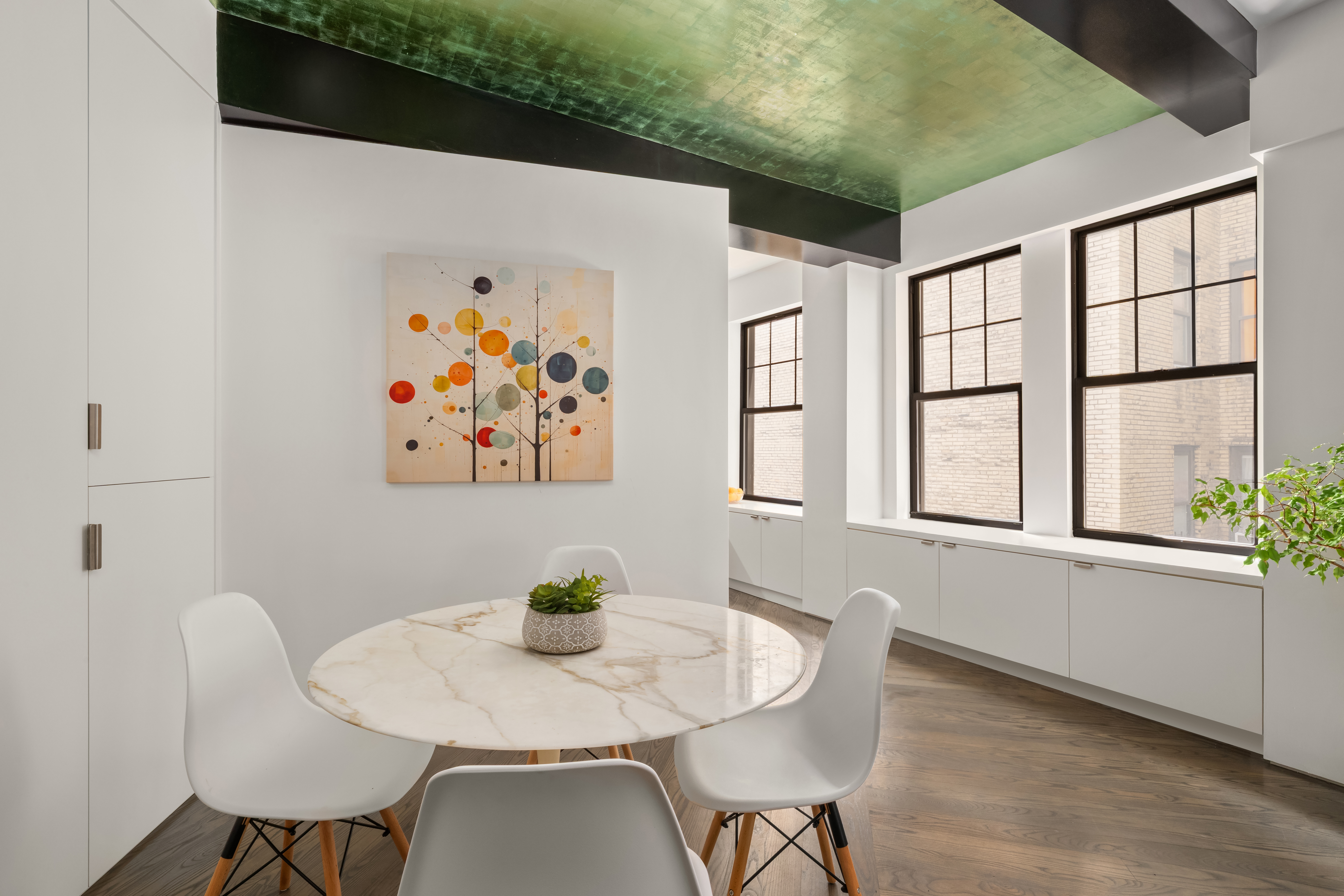 170 2nd Avenue, Unit 5A Manhattan, NY 10003 - Photo 10 of 15 a view of a dining room with furniture and window