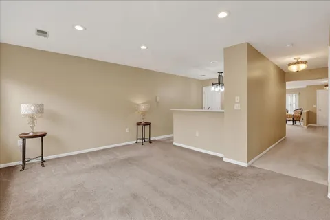 a view of a livingroom with a kitchen