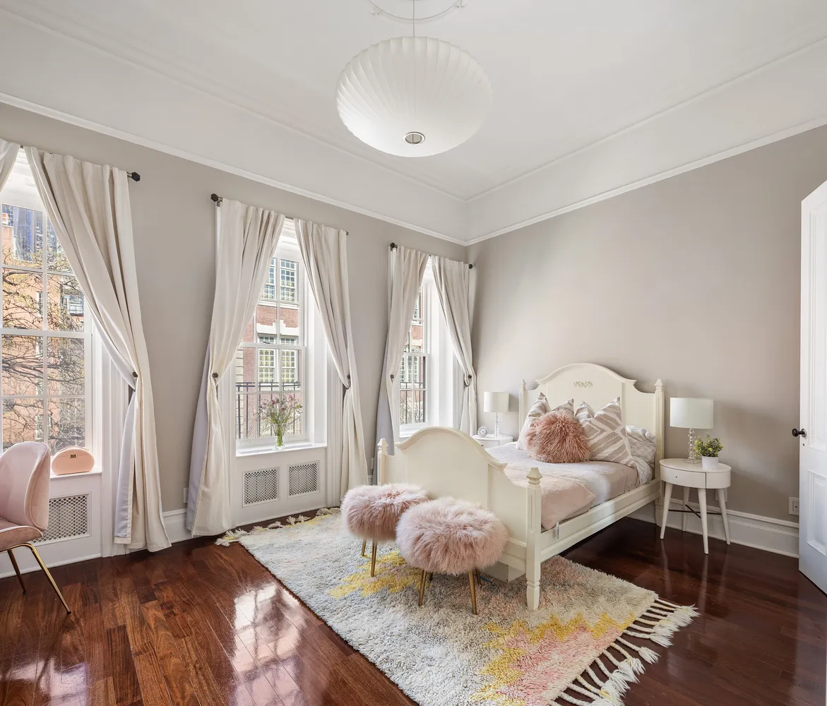 a bathroom with a granite countertop sink a mirror and a bathtub