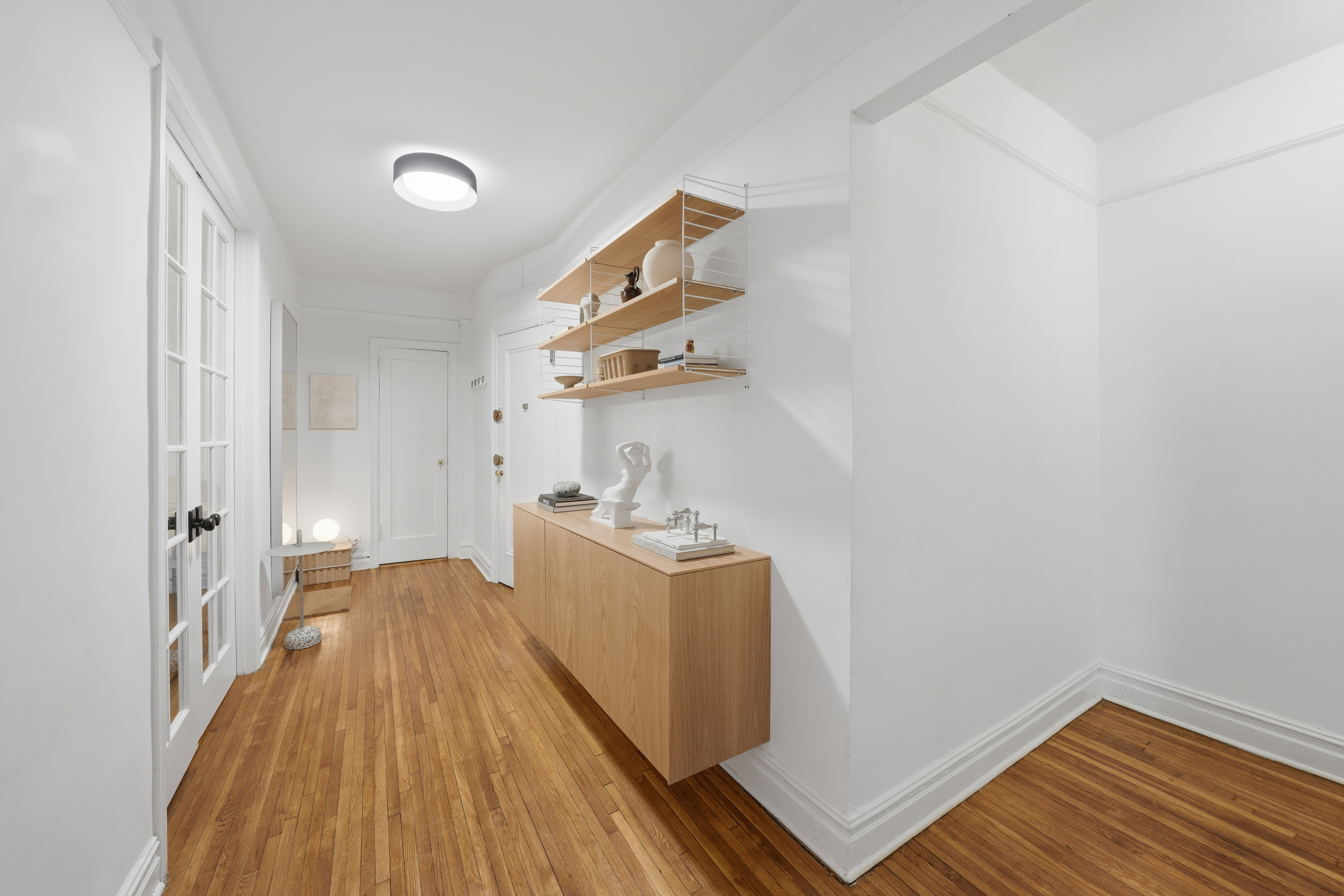 80 Avenue P, Unit D14 Brooklyn, NY 11204 - Photo 6 of 19 a view of a bedroom with wooden floor