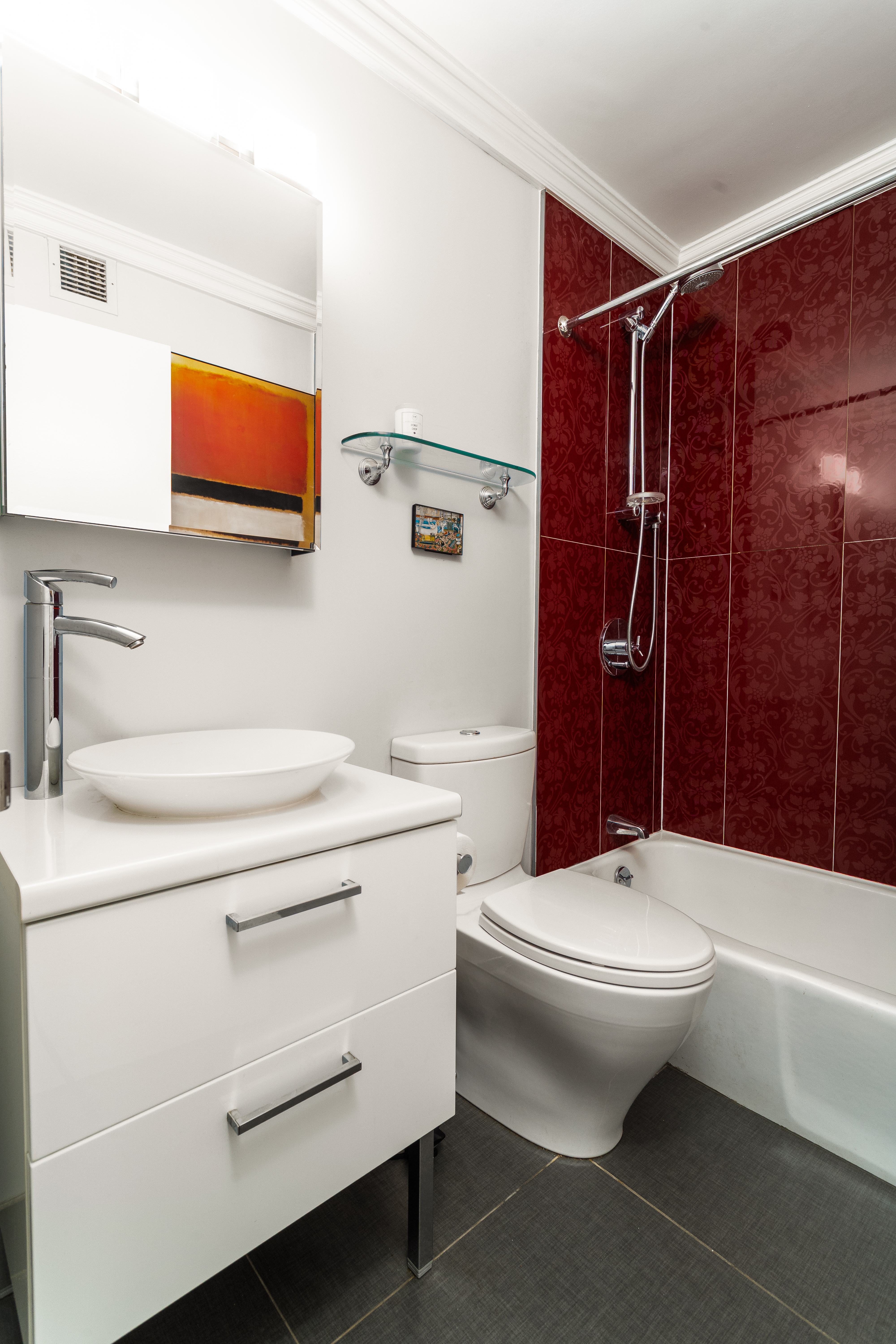 275 West 96th Street, Unit 12B Manhattan, NY 10025 - Photo 13 of 28 a bathroom with a sink toilet and shower