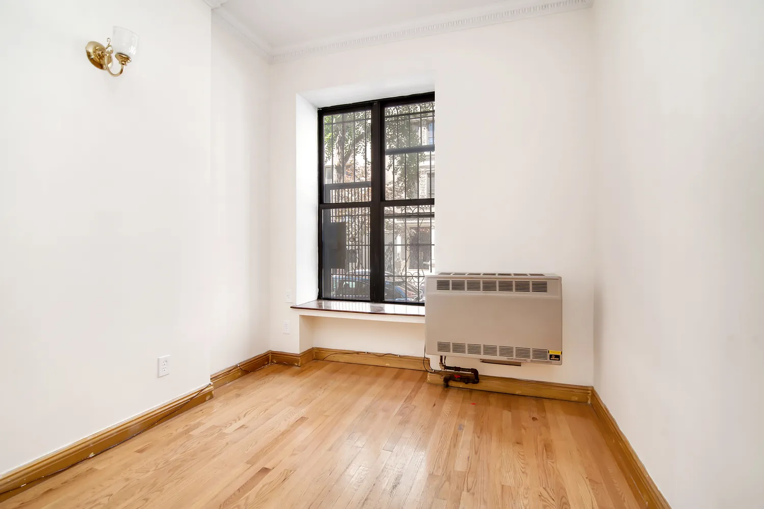 wooden floor and window in a room