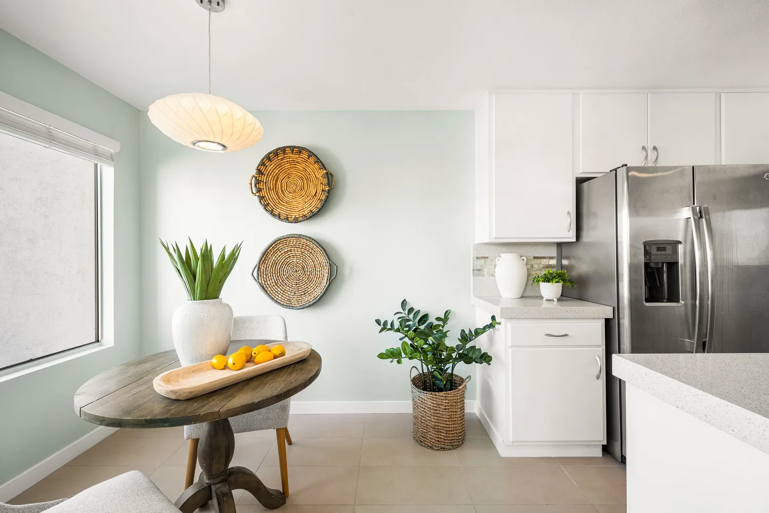 a spacious bathroom with a sink and a mirror