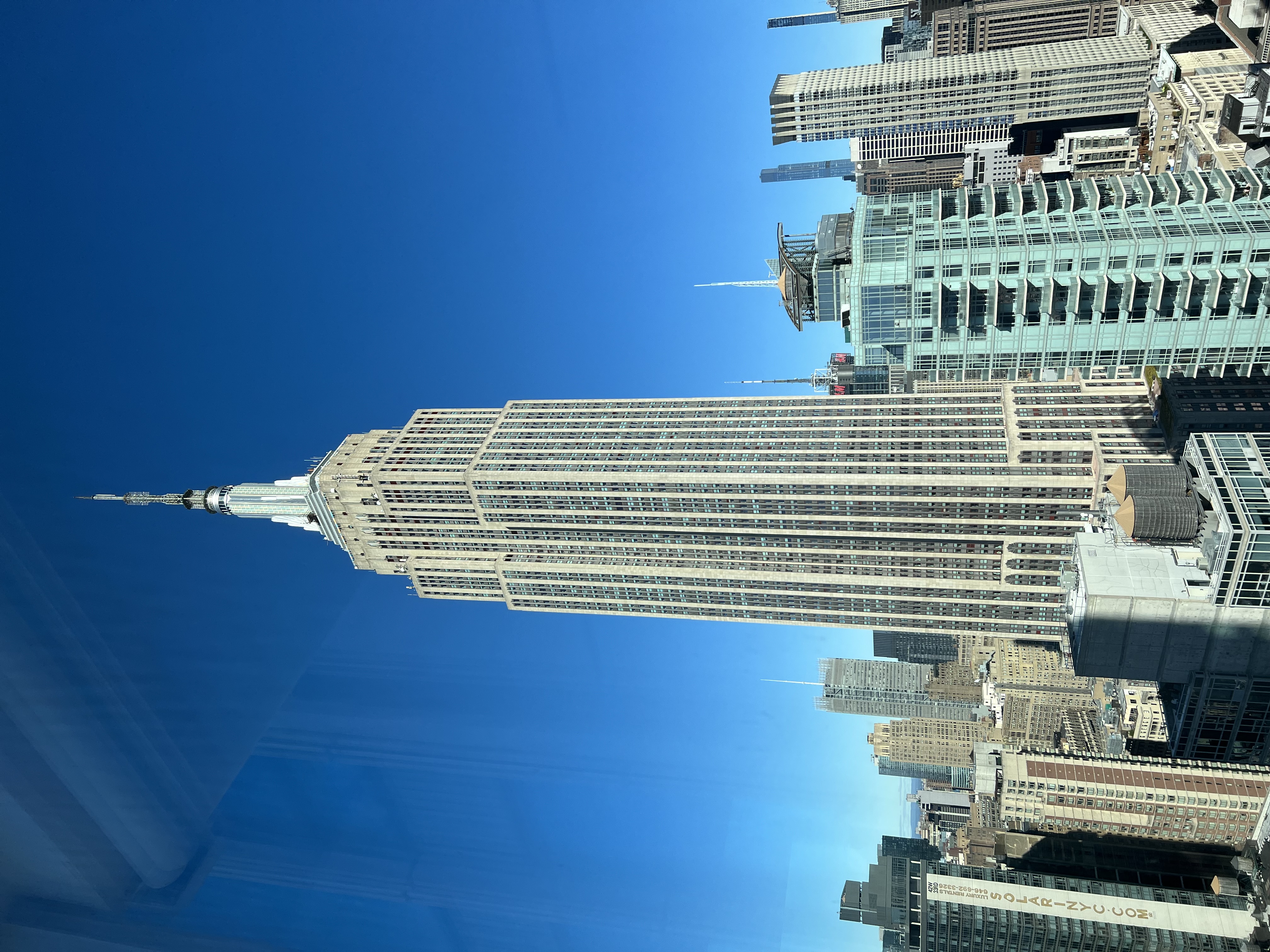 a view of a city with tall buildings