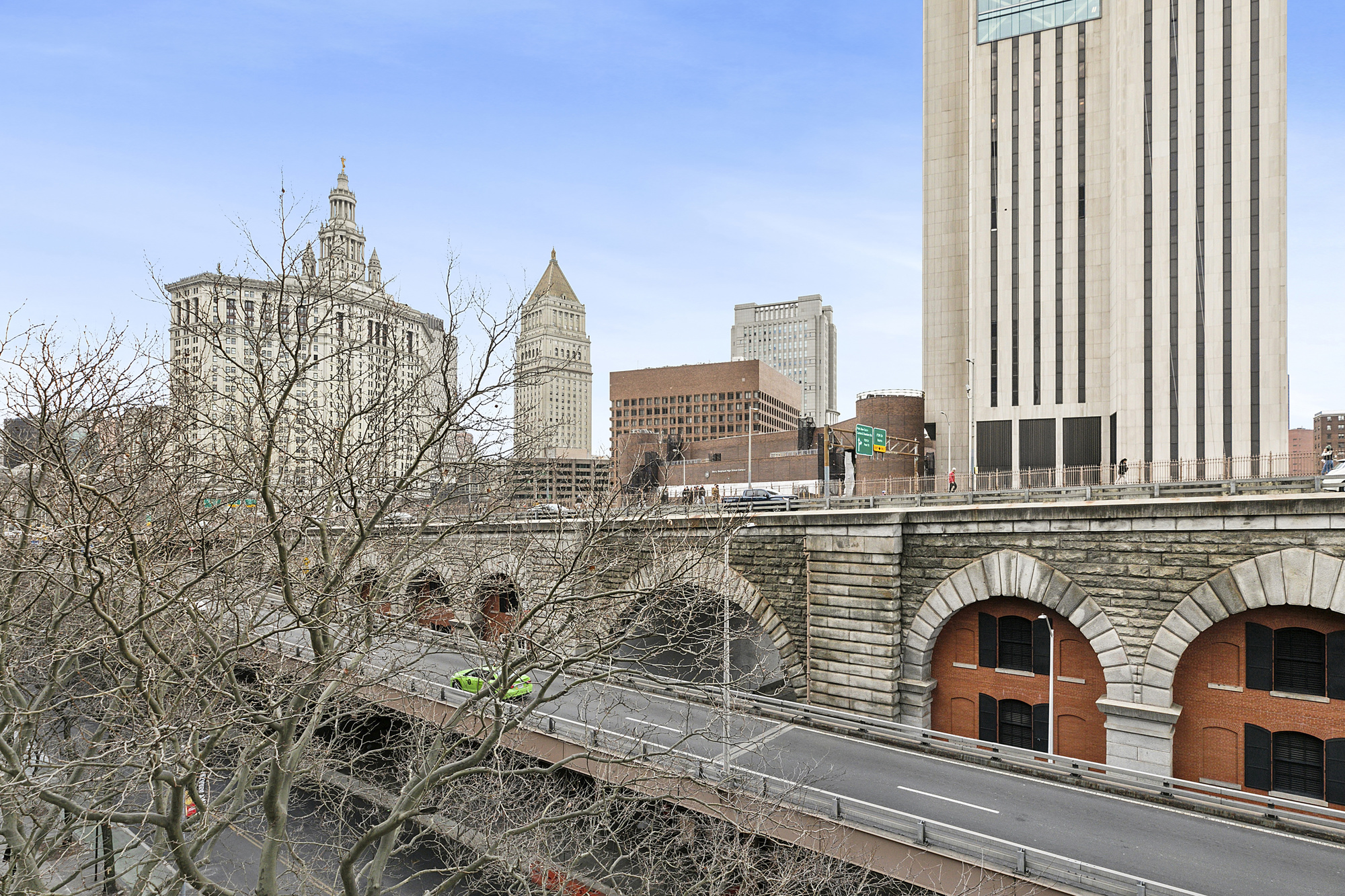 333 Pearl Street, Unit 6K Manhattan, NY 10038 - Photo 2 of 7 a view of building with yard and staircase