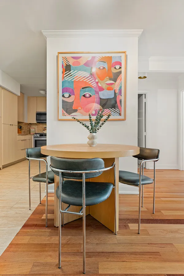a workspace with furniture and wooden floor