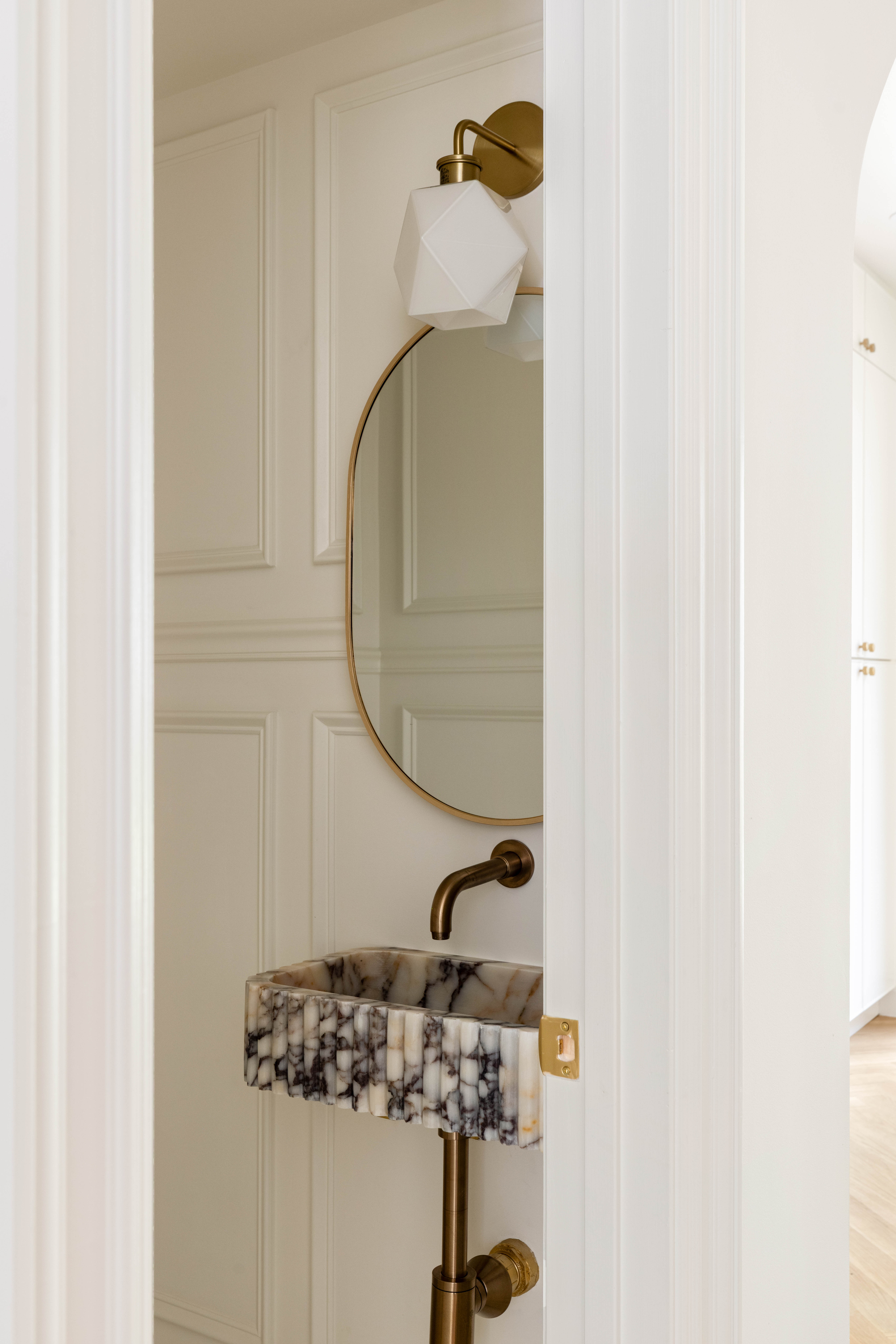 287 Midwood Street Brooklyn, NY 11225 - Photo 7 of 17 a bathroom with a sink and a mirror