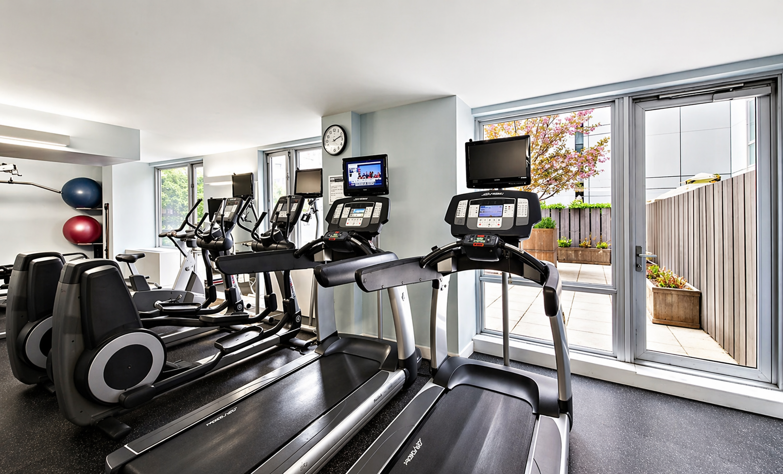 464 West 44th Street, Unit PHA Manhattan, NY 10036 - Photo 9 of 13 a view of a room with gym equipment