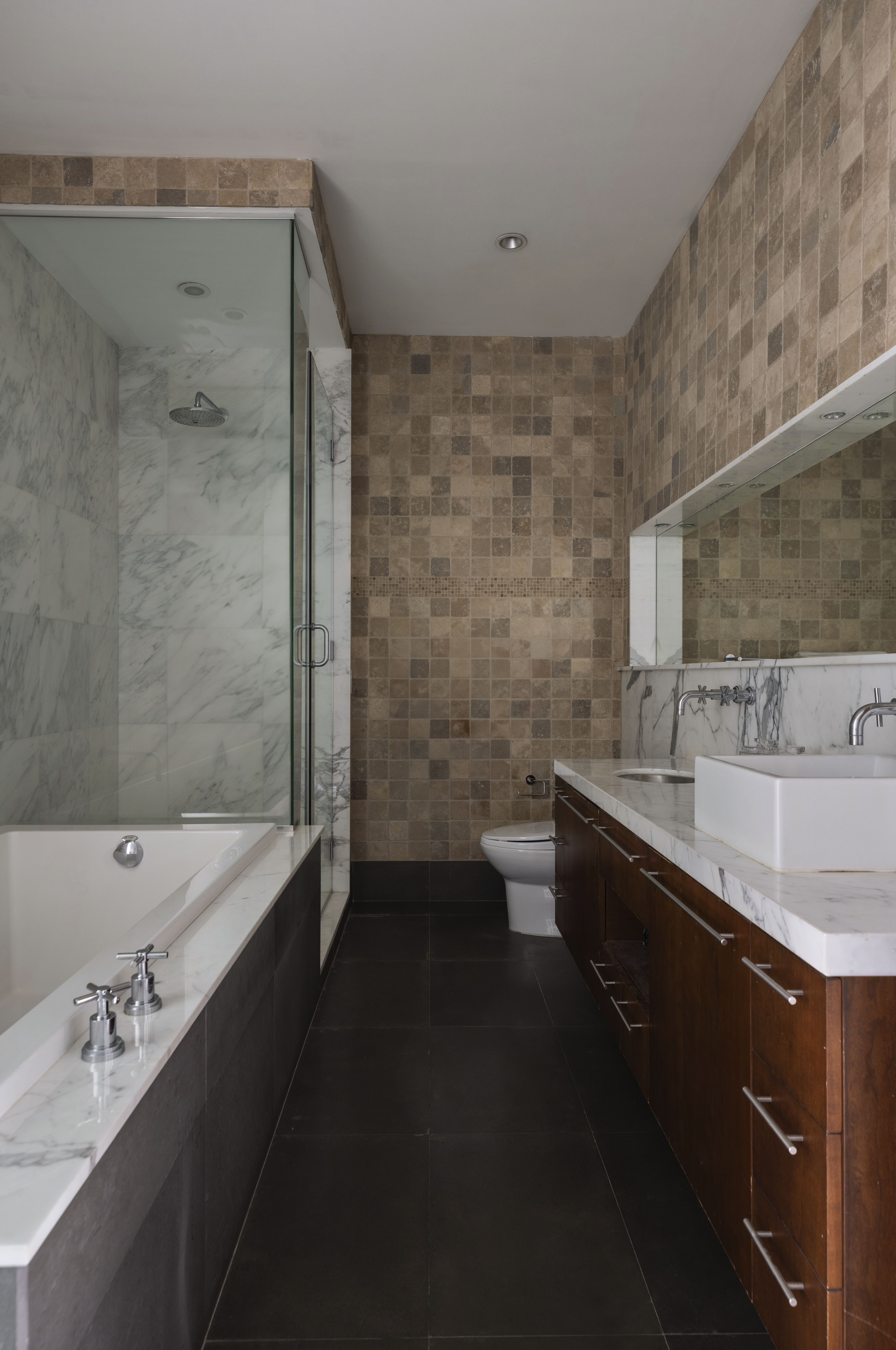 60 Broadway, Unit 8K Brooklyn, NY 11249 - Photo 6 of 10 a bathroom with a bathtub and a sink