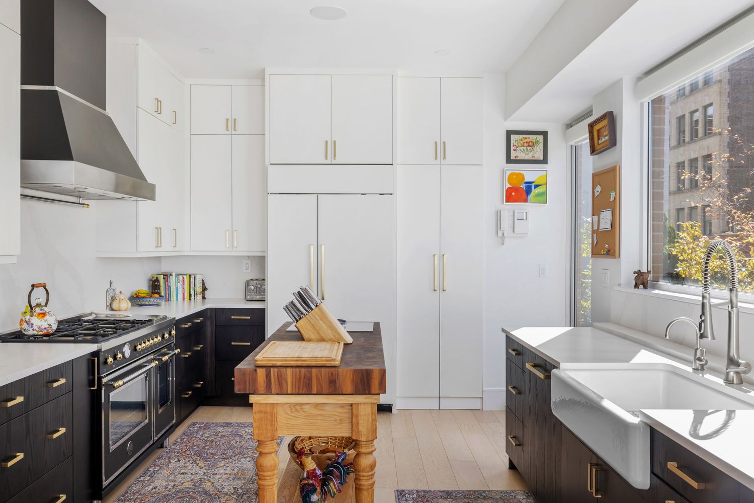 a kitchen that has a sink and a stove