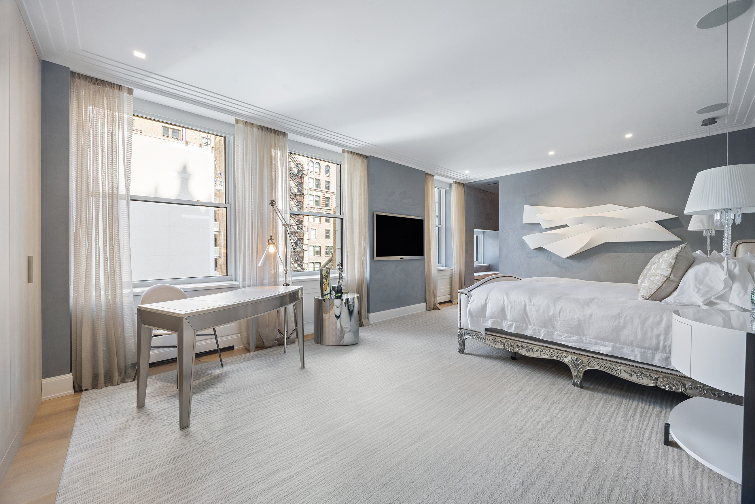 55 Liberty Street, Unit 15 Manhattan, NY 10005 - Photo 11 of 25 a living room with a bed furniture and a window