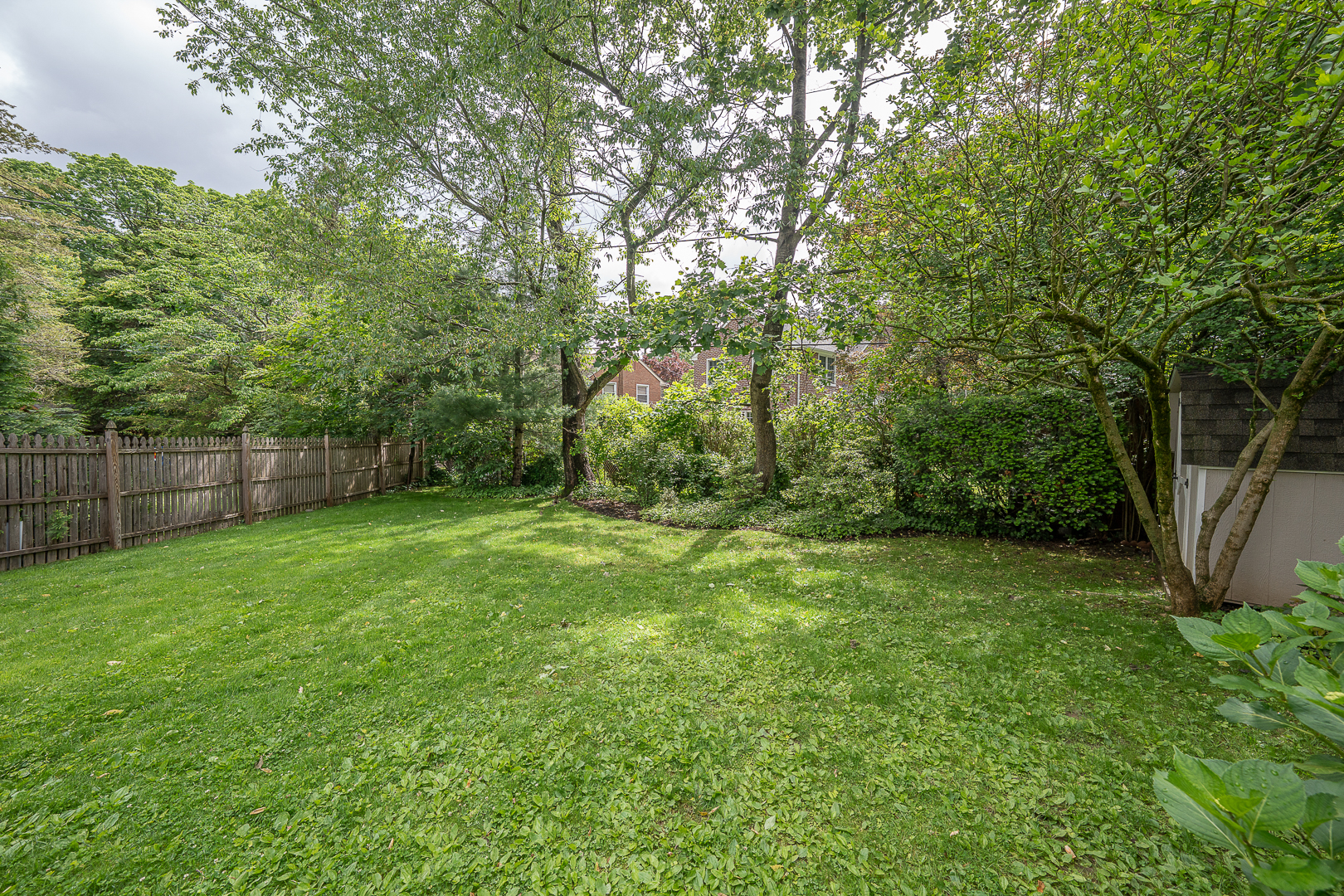 519 Mercer Road Merion Station, PA 19066 - Photo 57 of 58 a view of a yard with a trees