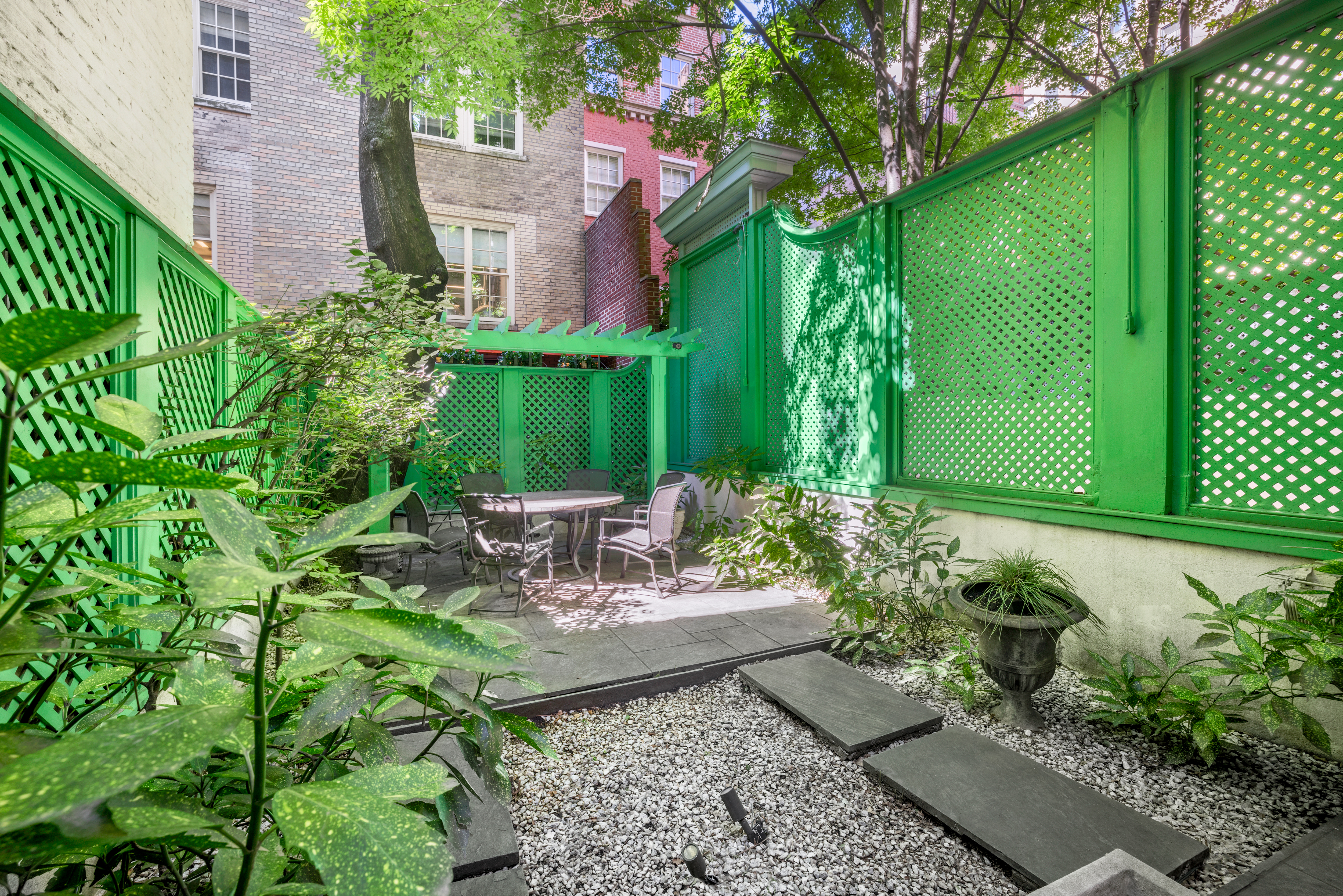 22 East 78th Street Manhattan, NY 10075 - Photo 2 of 23 a view of a chair and table in the garden