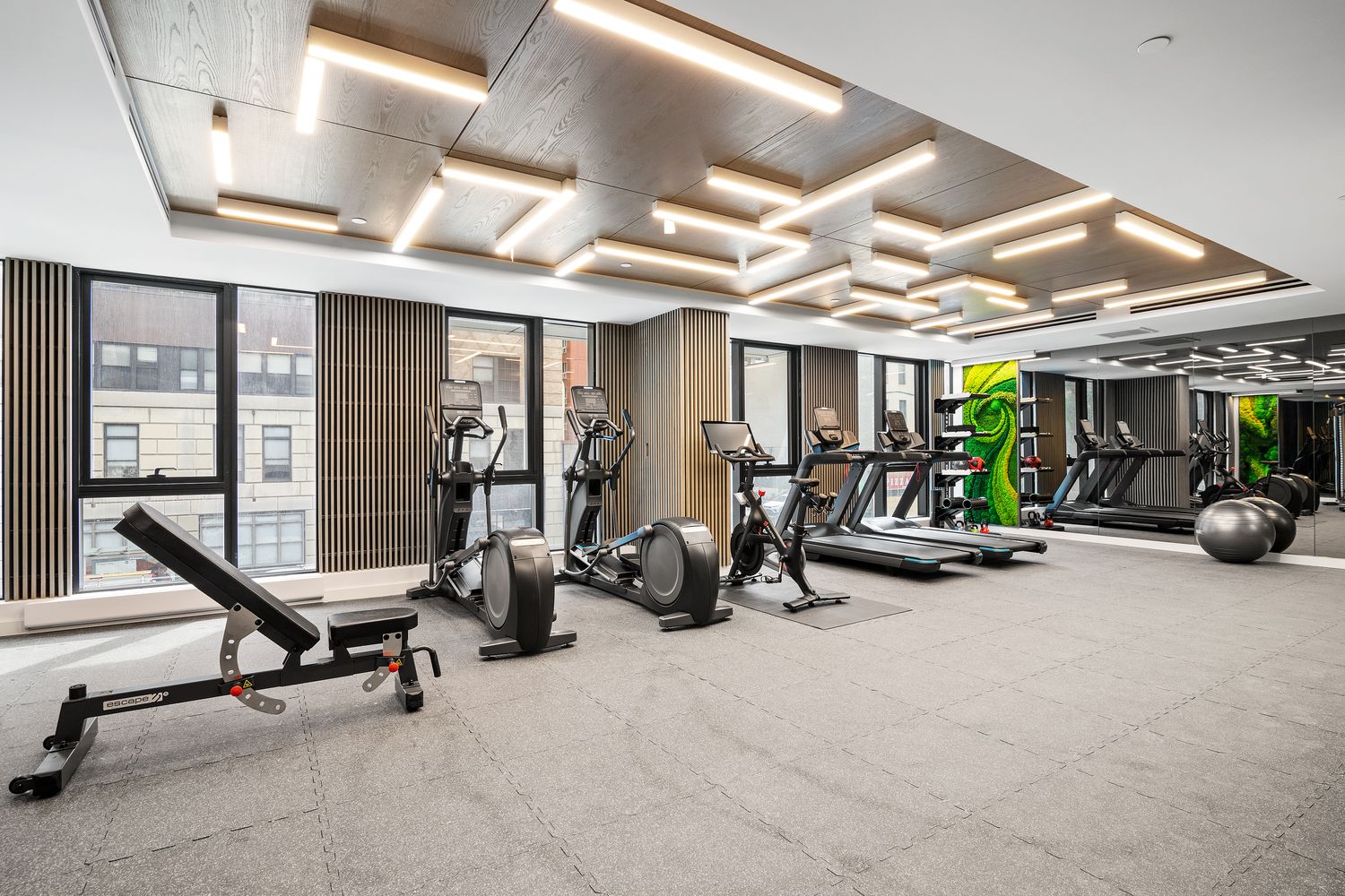 300 West 30th Street, Unit 11E Manhattan, NY 10001 - Photo 7 of 10 a view of a room with gym equipment