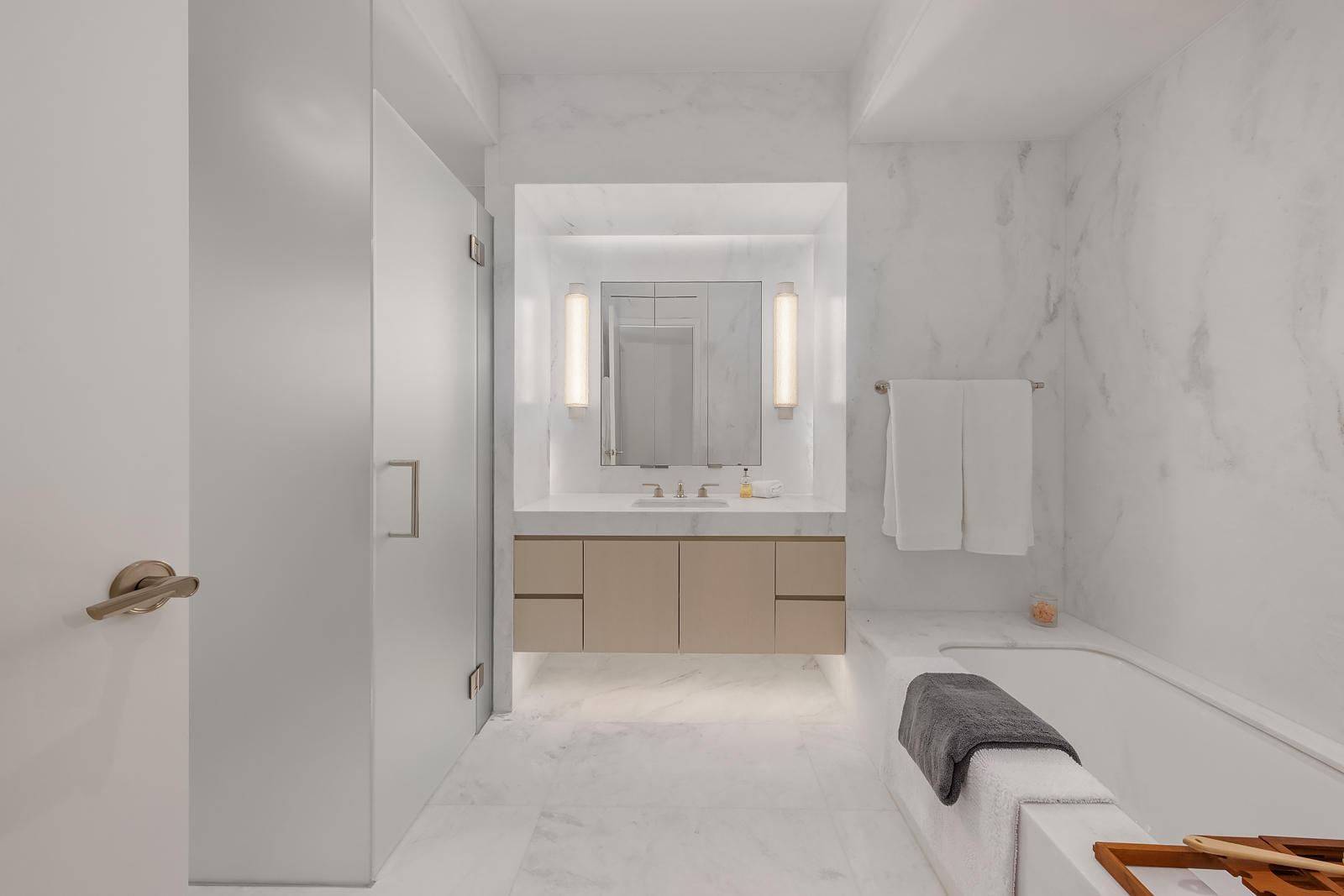 1228 Madison Avenue, Unit 10 Manhattan, NY 10128 - Photo 12 of 21 a bathroom with a tub sink and mirror