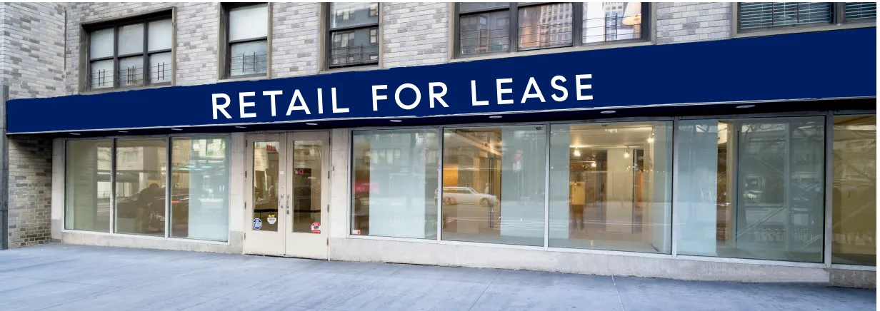 a sign broad in front of building