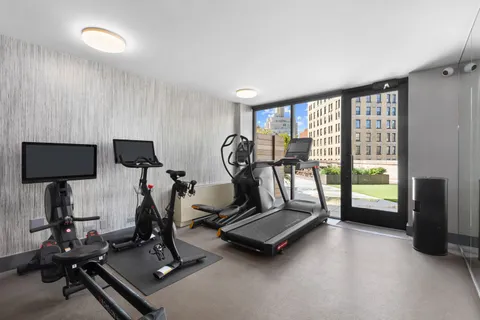 a view of a room with gym equipment
