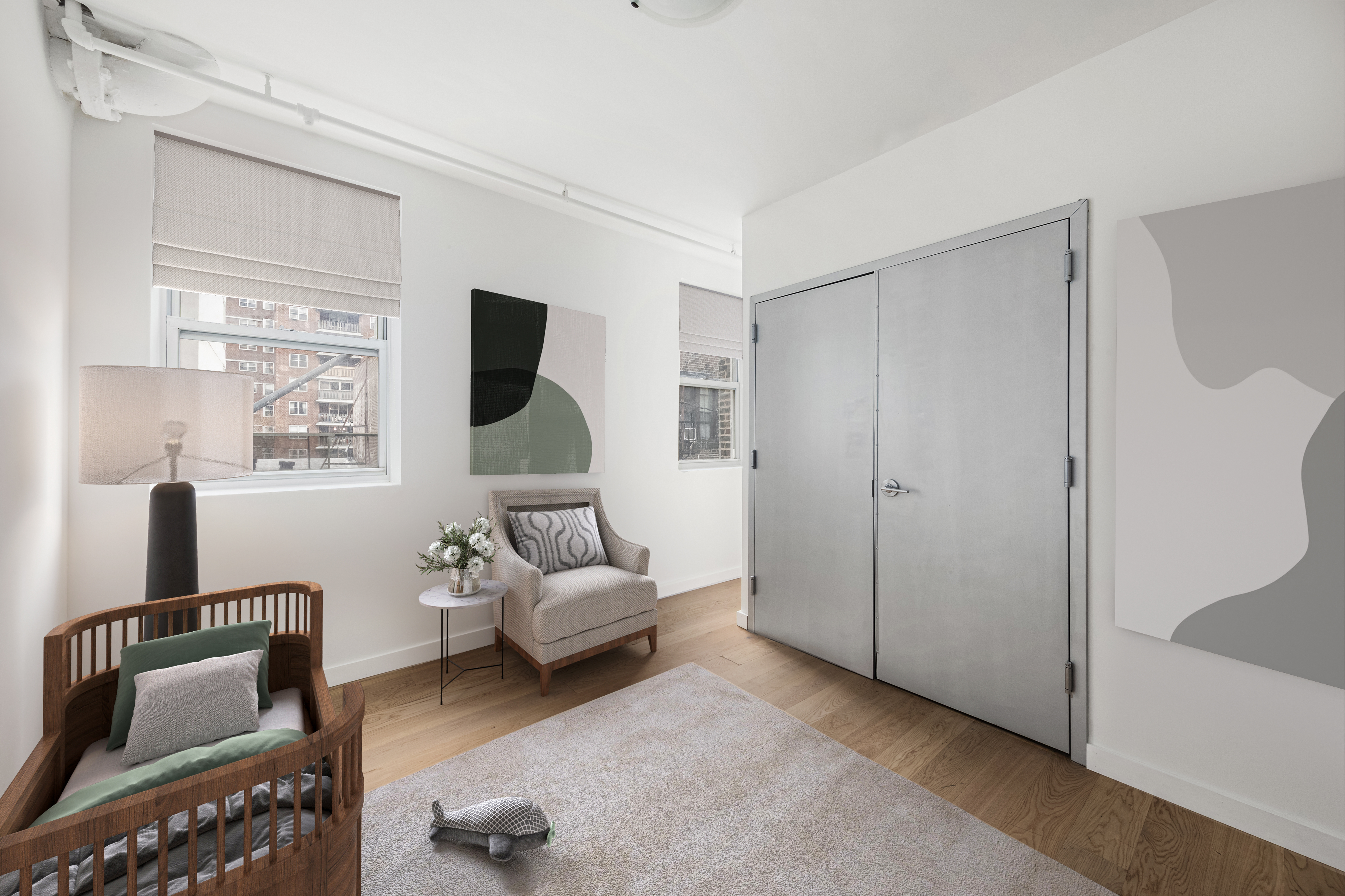 253 West 28th Street, Unit 5 Manhattan, NY 10001 - Photo 15 of 19 a living room with furniture and a flat screen tv