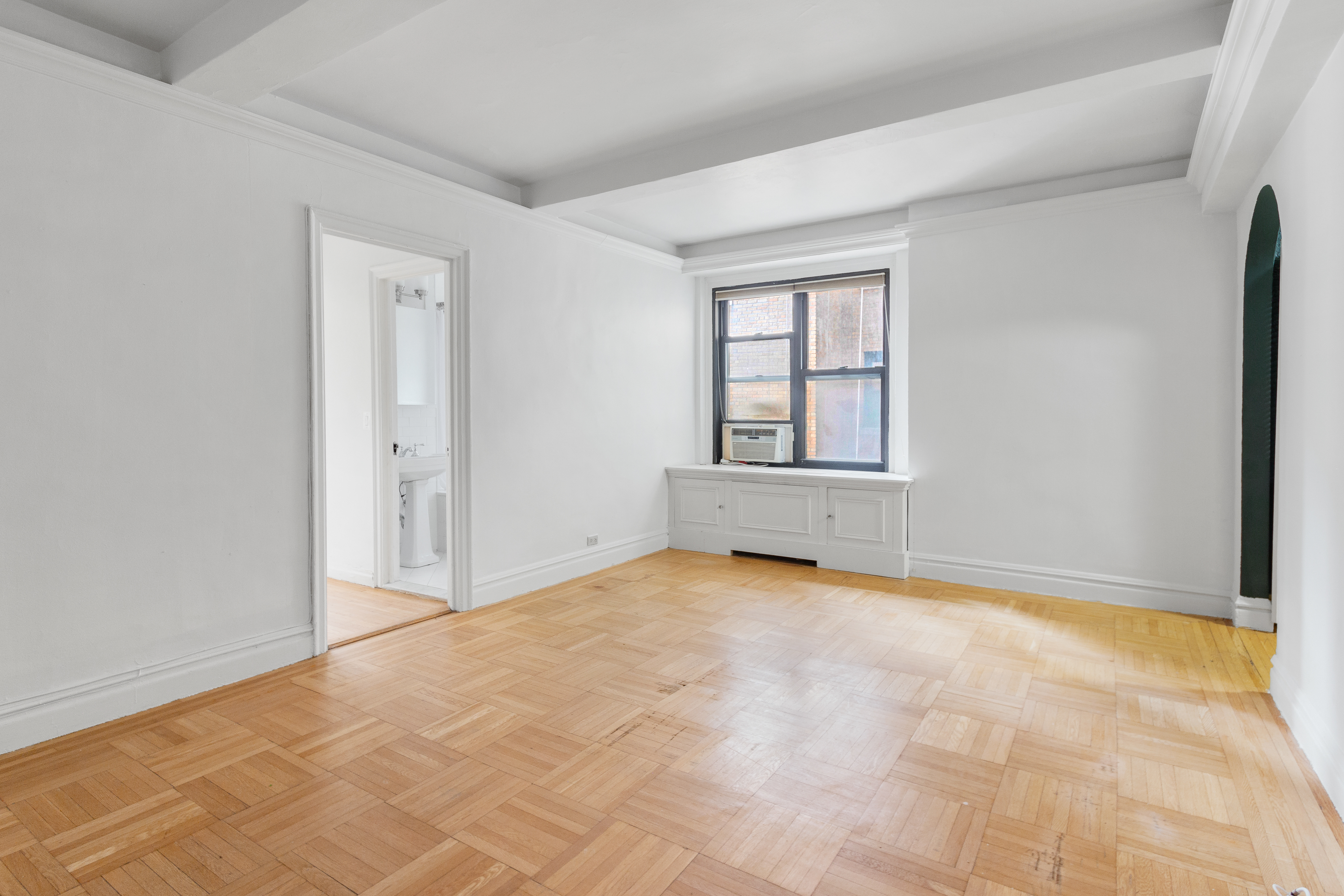 235 West End Avenue, Unit 8G Manhattan, NY 10023 - Photo 2 of 13 an empty room with windows
