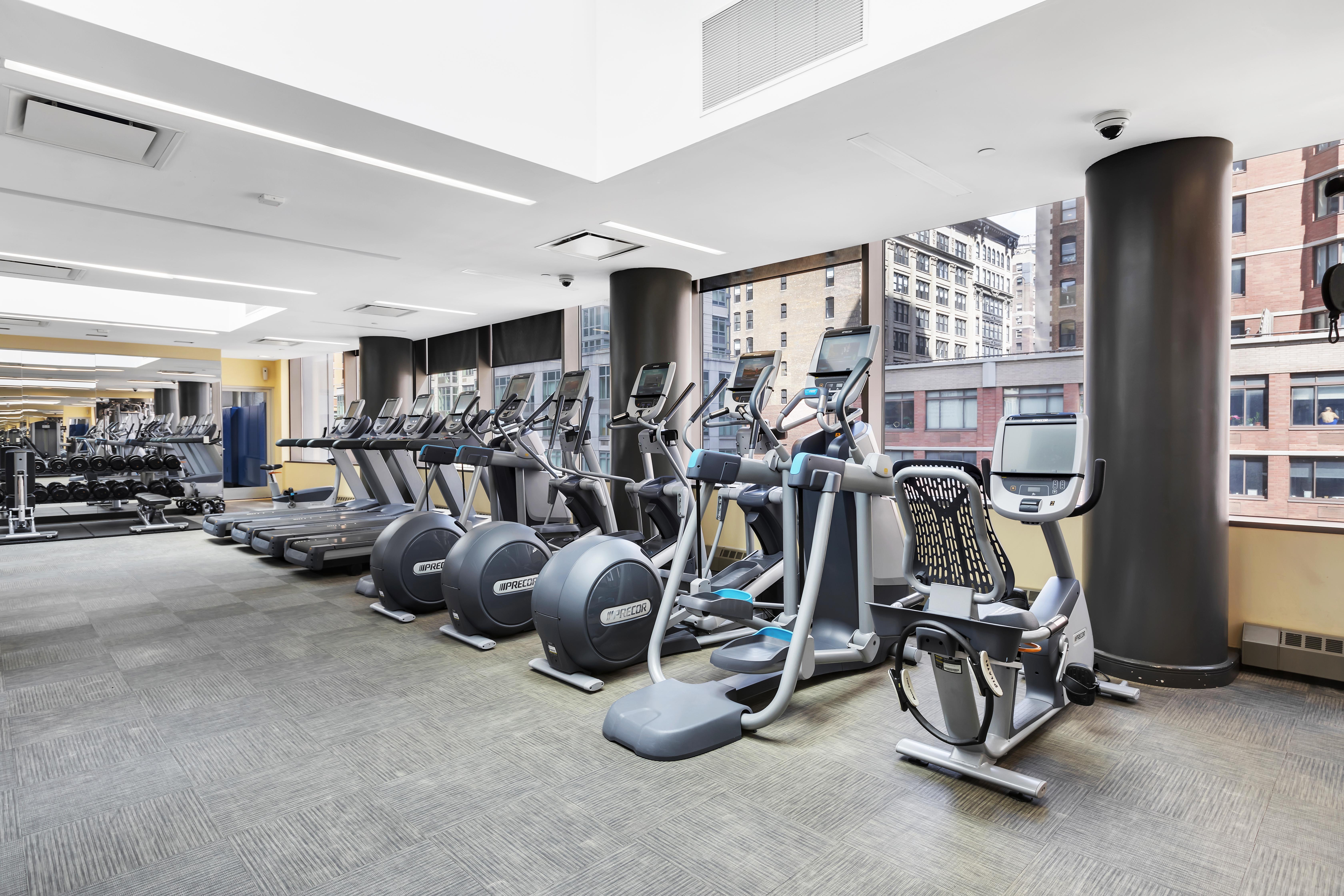 101 West 24th Street, Unit 16D Manhattan, NY 10011 - Photo 17 of 23 a view of a room with gym equipment