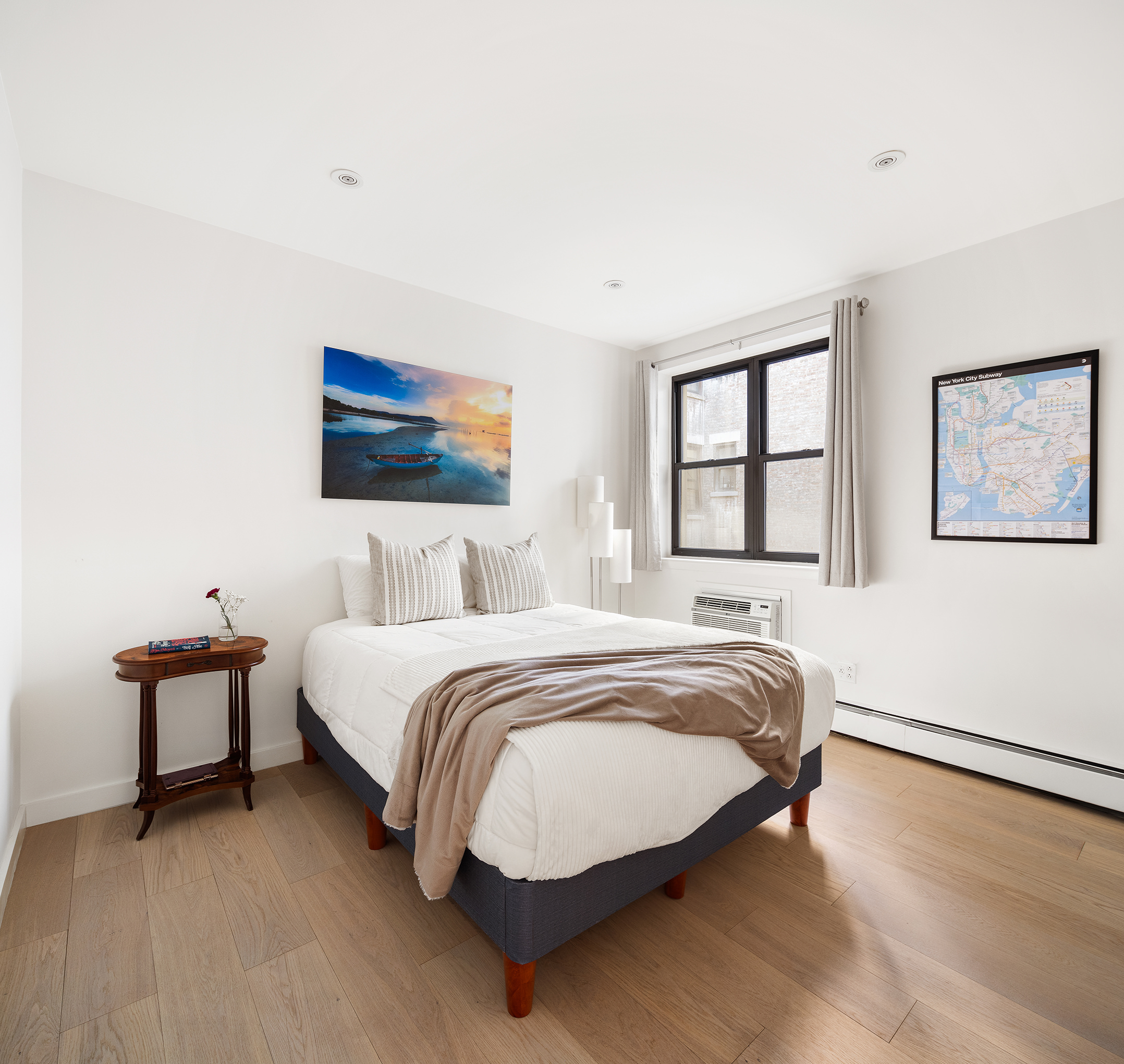 315 West 99th Street, Unit 5A Manhattan, NY 10025 - Photo 5 of 8 a spacious bedroom with a bed and window