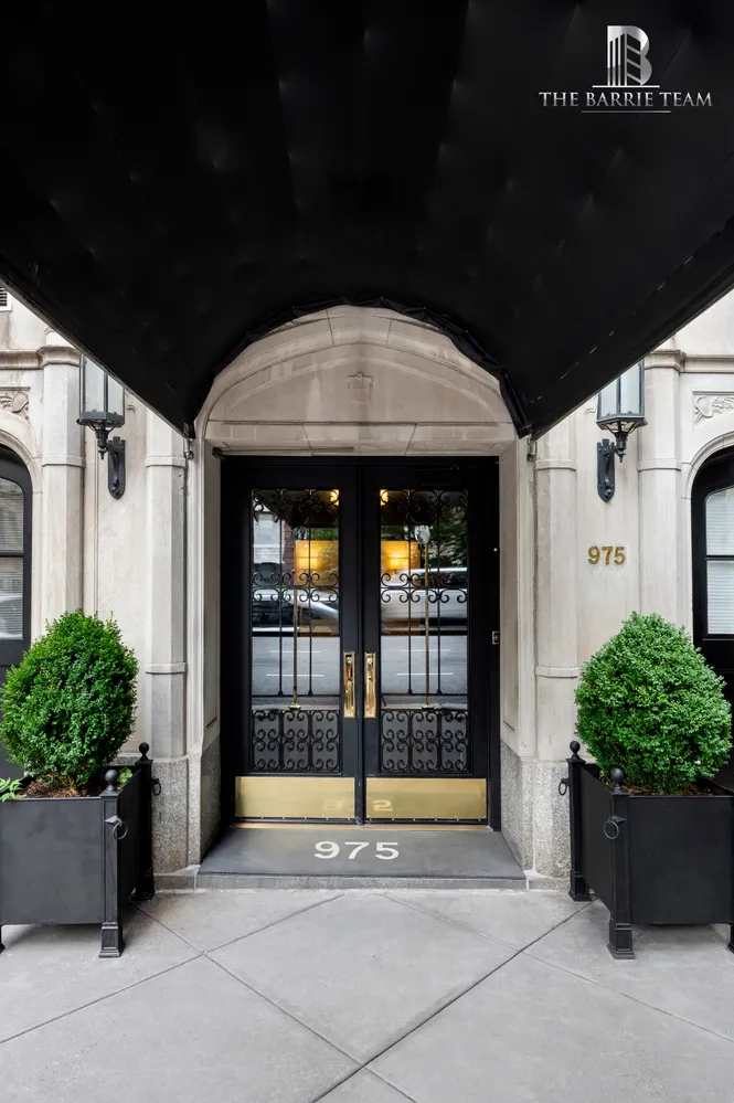 a view of a porch with seating space