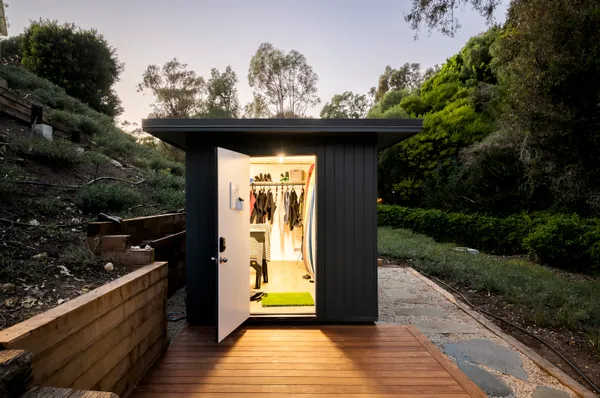 a bathroom with a shower curtain and a window