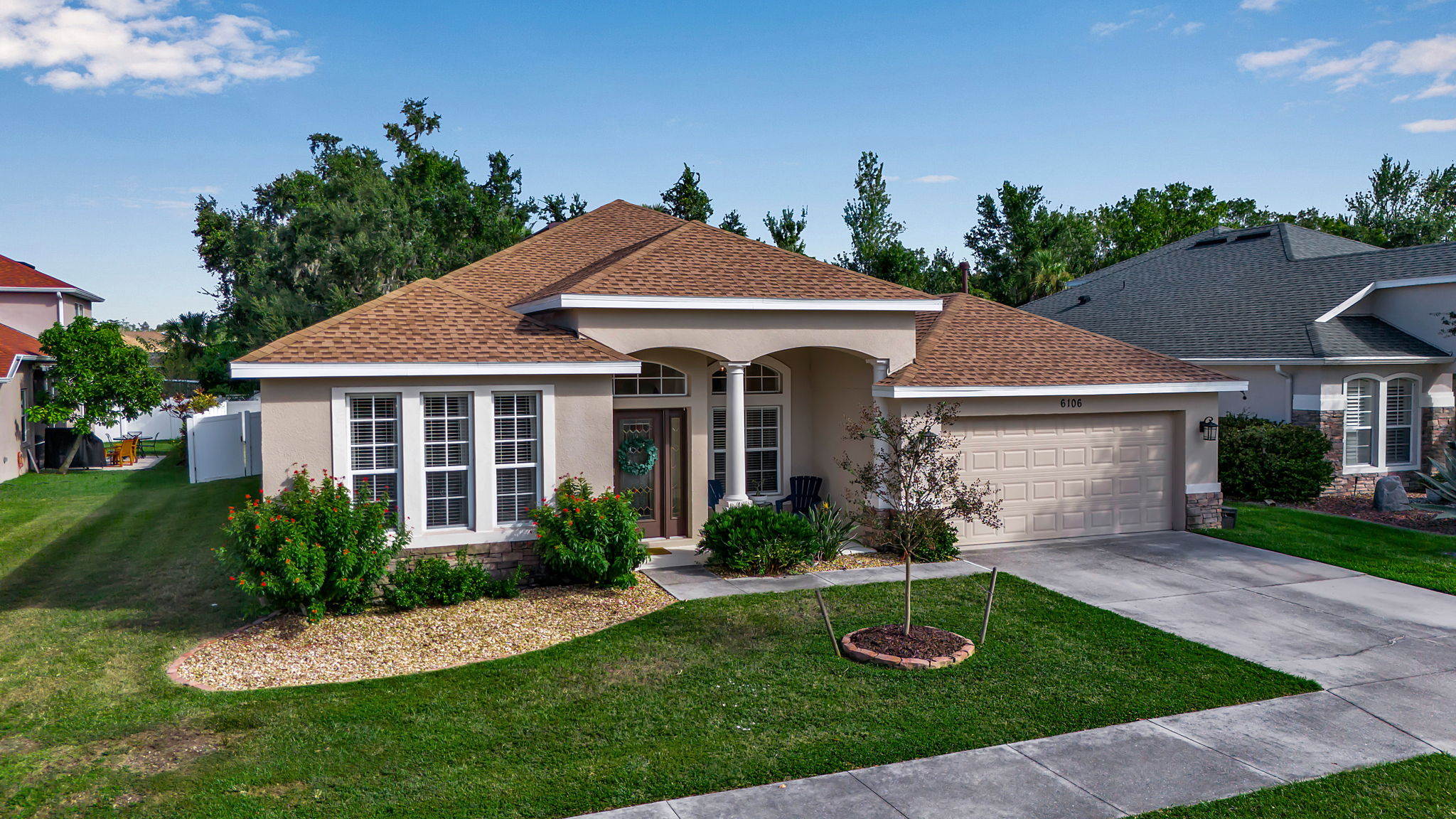 6106 34th Court East Bradenton, FL 34203 - Photo 3 of 69 a view of a yard in front of house