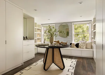 a bathroom with a granite countertop sink a toilet and shower
