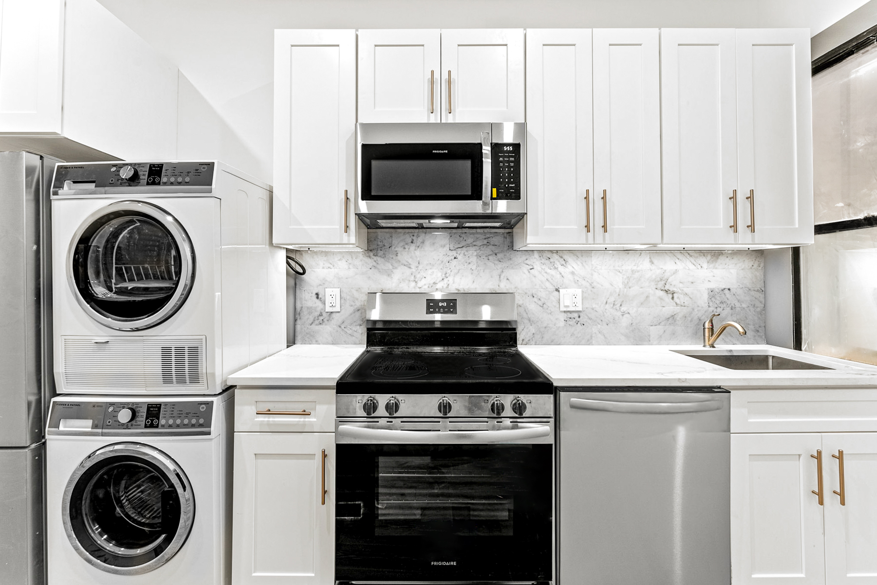 280 Suydam Street, Unit 2R Brooklyn, NY 11237 - Photo 2 of 6 a kitchen with a stove and a sink