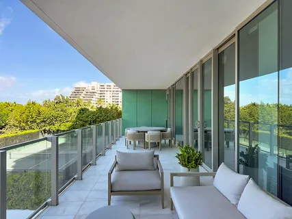 a view of swimming pool with outdoor seating