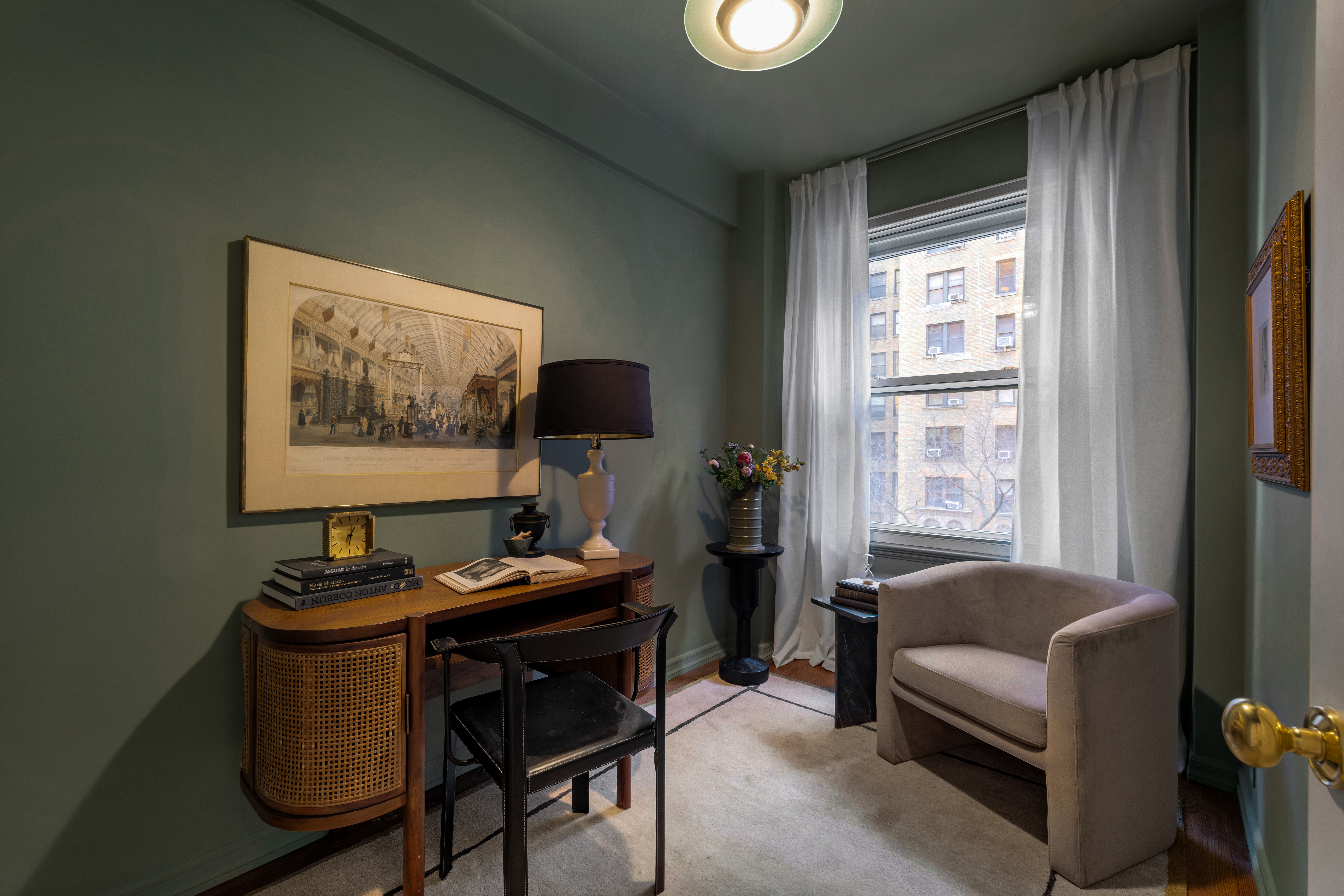 320 East 72nd Street, Unit 5B Manhattan, NY 10021 - Photo 16 of 18 a living room with furniture and a window