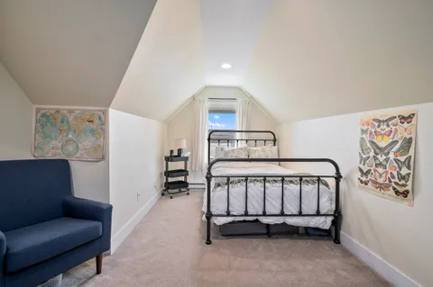 a bedroom with furniture and a couch