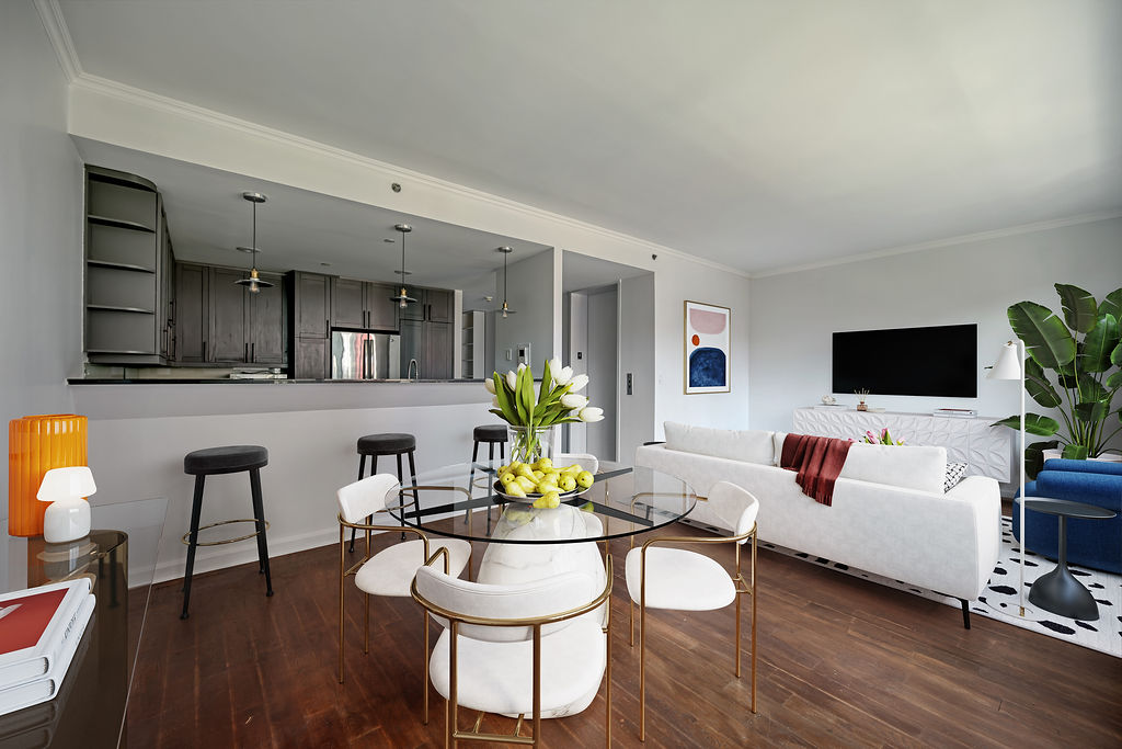 32 West 128th Street, Unit 4 Manhattan, NY 10027 - Photo 2 of 12 a living room with furniture and a flat screen tv