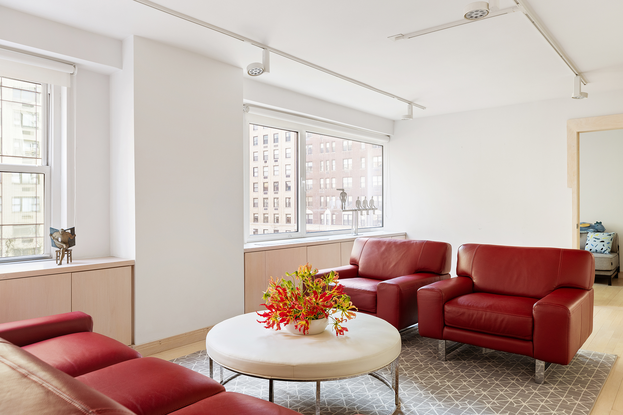 1065 Park Avenue, Unit 5BC Manhattan, NY 10128 - Photo 2 of 16 a living room with furniture and a table