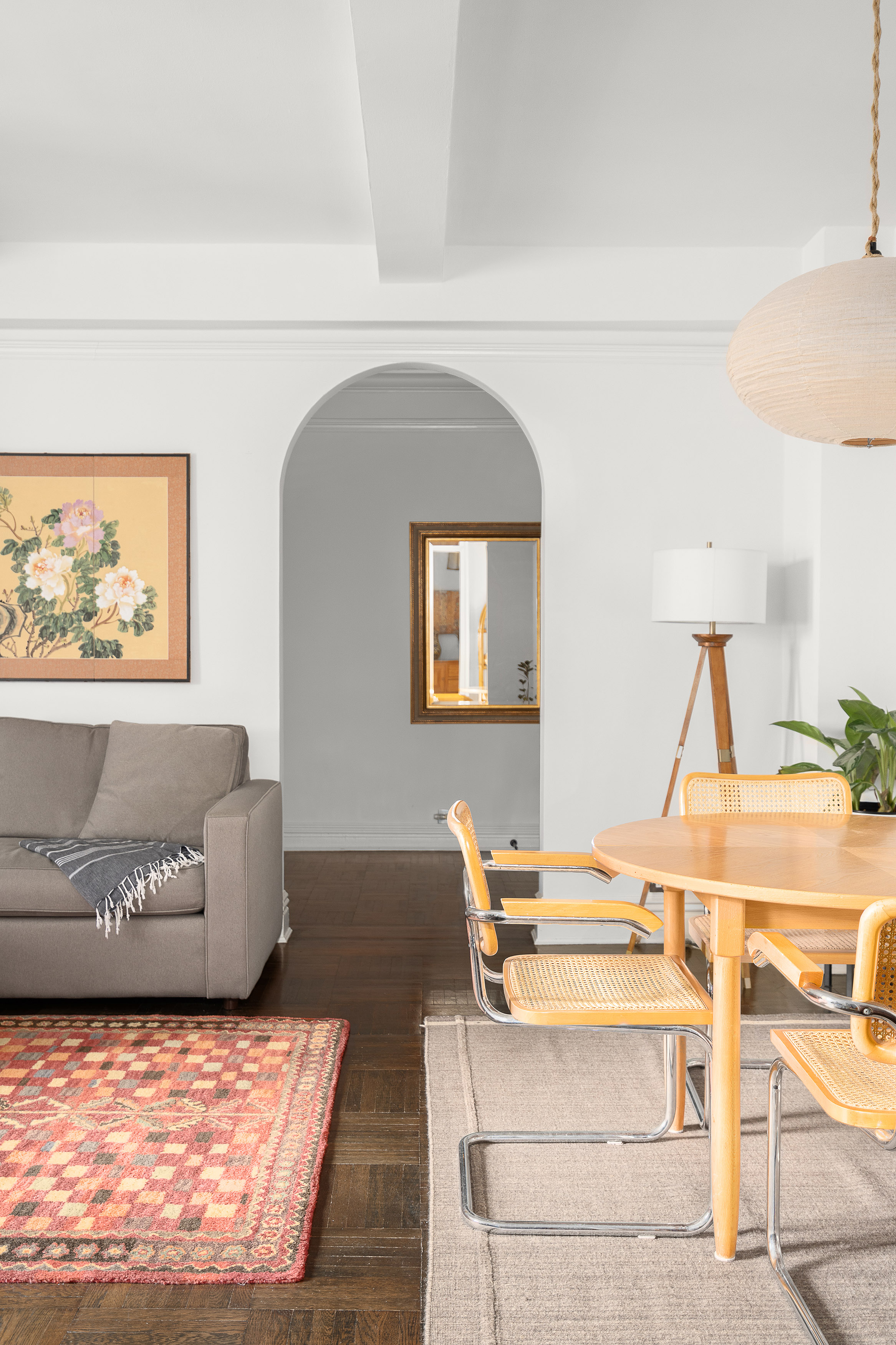 235 West End Avenue, Unit 8D Manhattan, NY 10023 - Photo 2 of 11 a living room with furniture and a flat screen tv