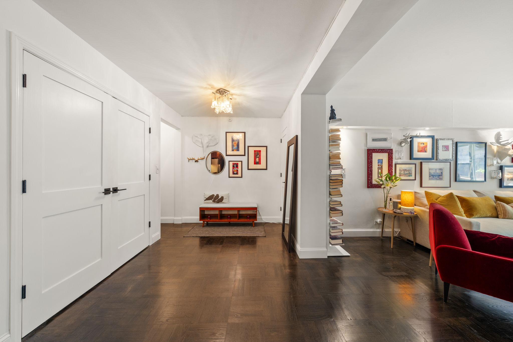 310 Lexington Avenue, Unit 2J Manhattan, NY 10016 - Photo 4 of 11 a view of a livingroom with furniture and wooden floor