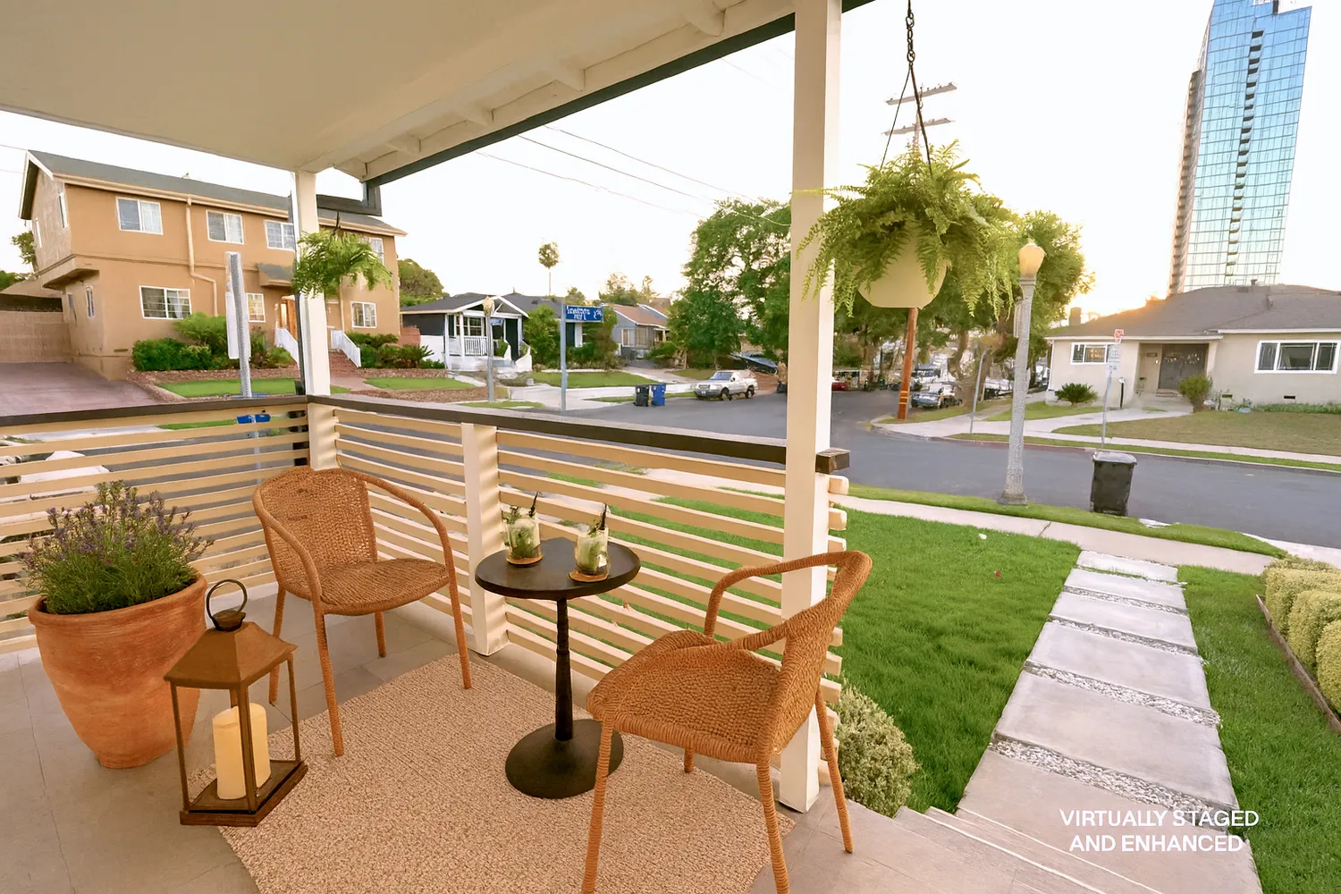 a view of a patio with a table and chairs