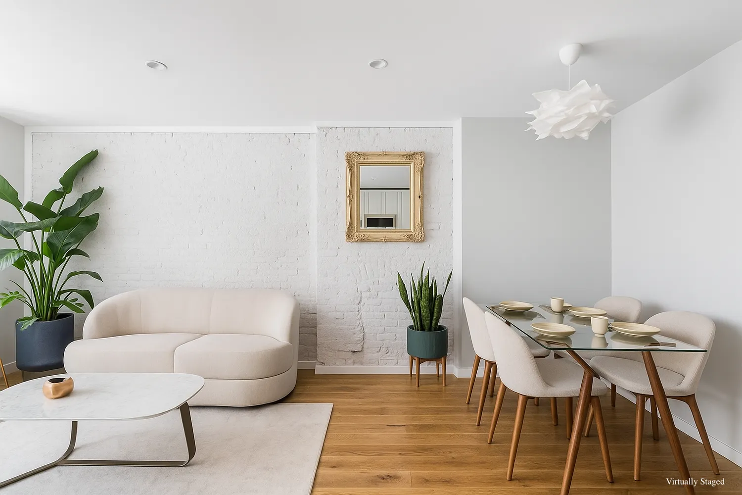 a living room with furniture and a potted plant