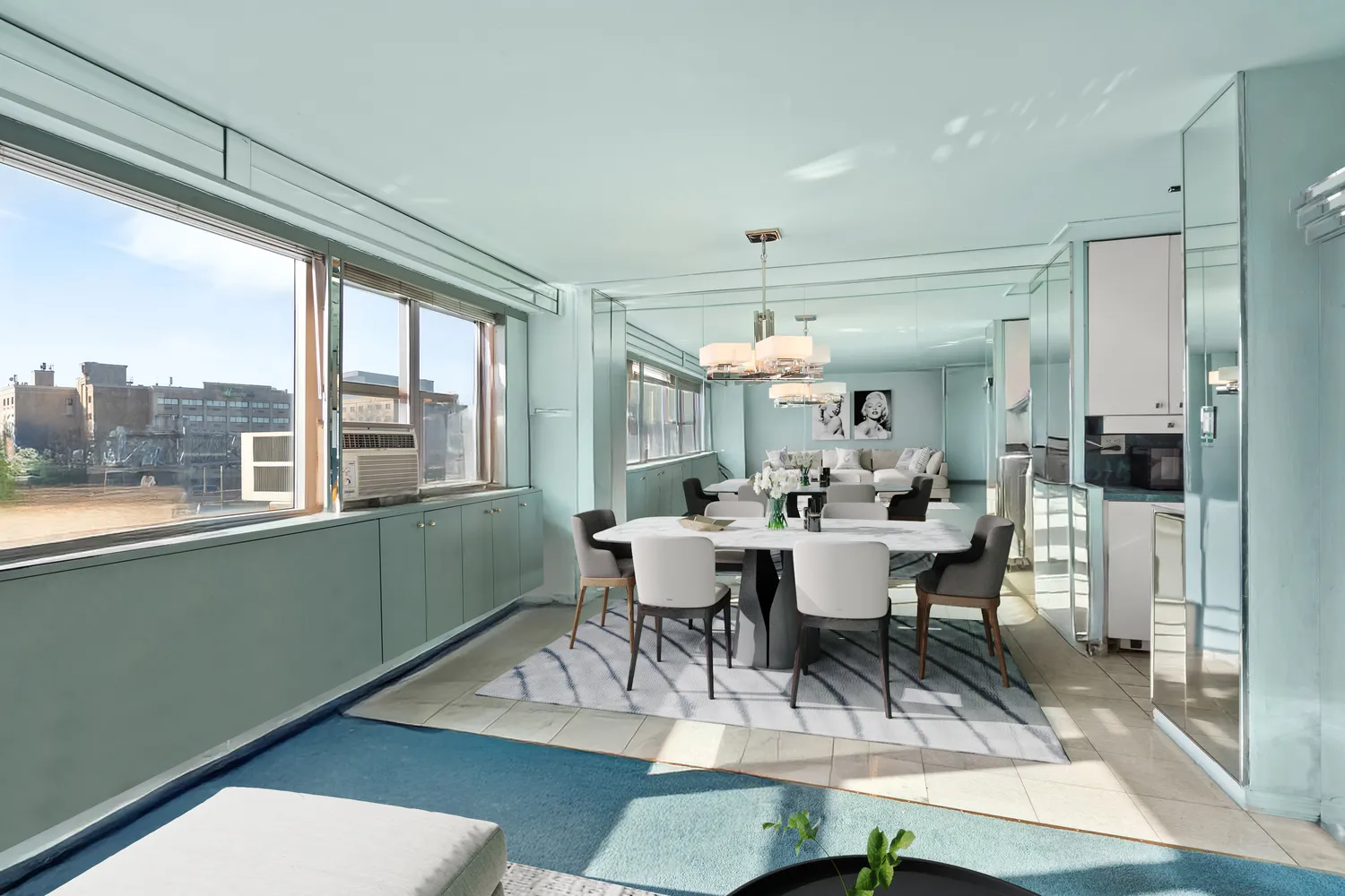 a view of a dining room with furniture window and wooden floor