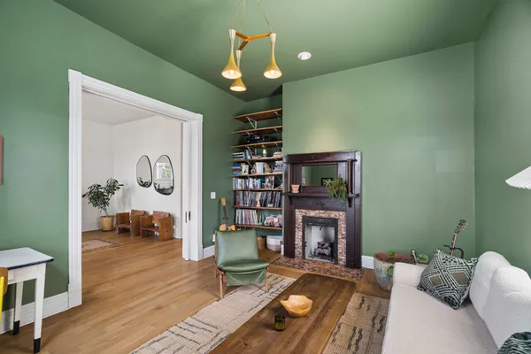 a living room with furniture and a table